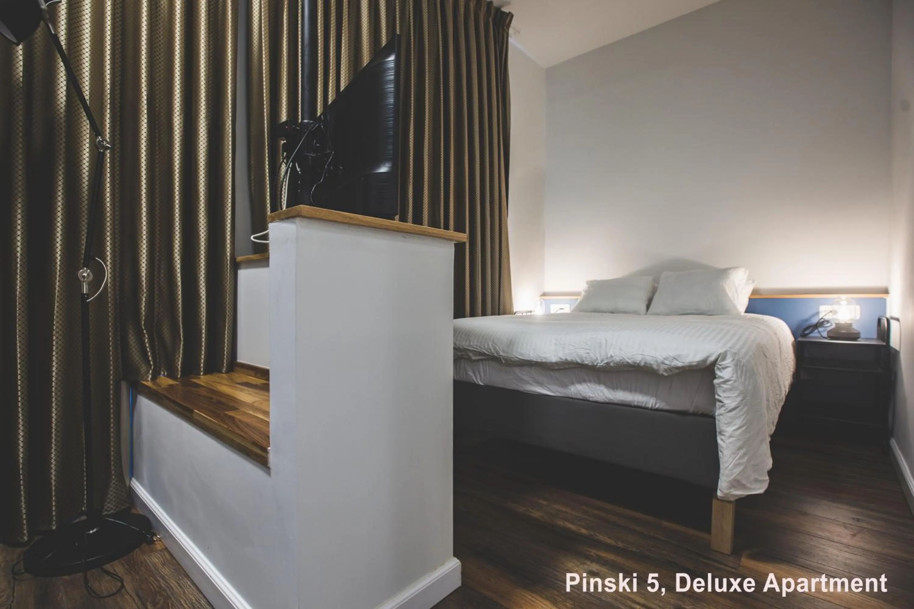 Bed in Carmel Boutique Apartments