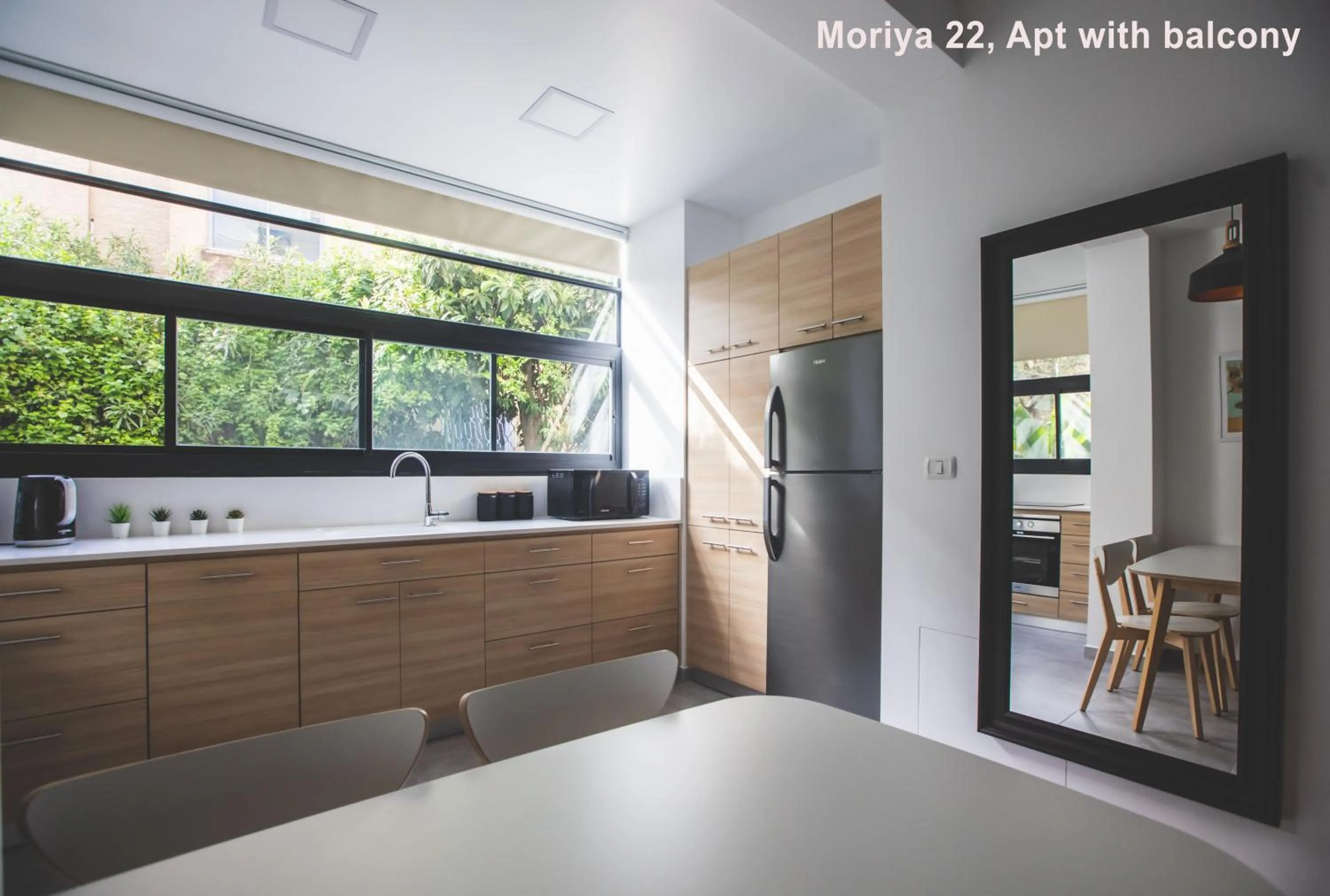 Kitchen or kitchenette in Carmel Boutique Apartments