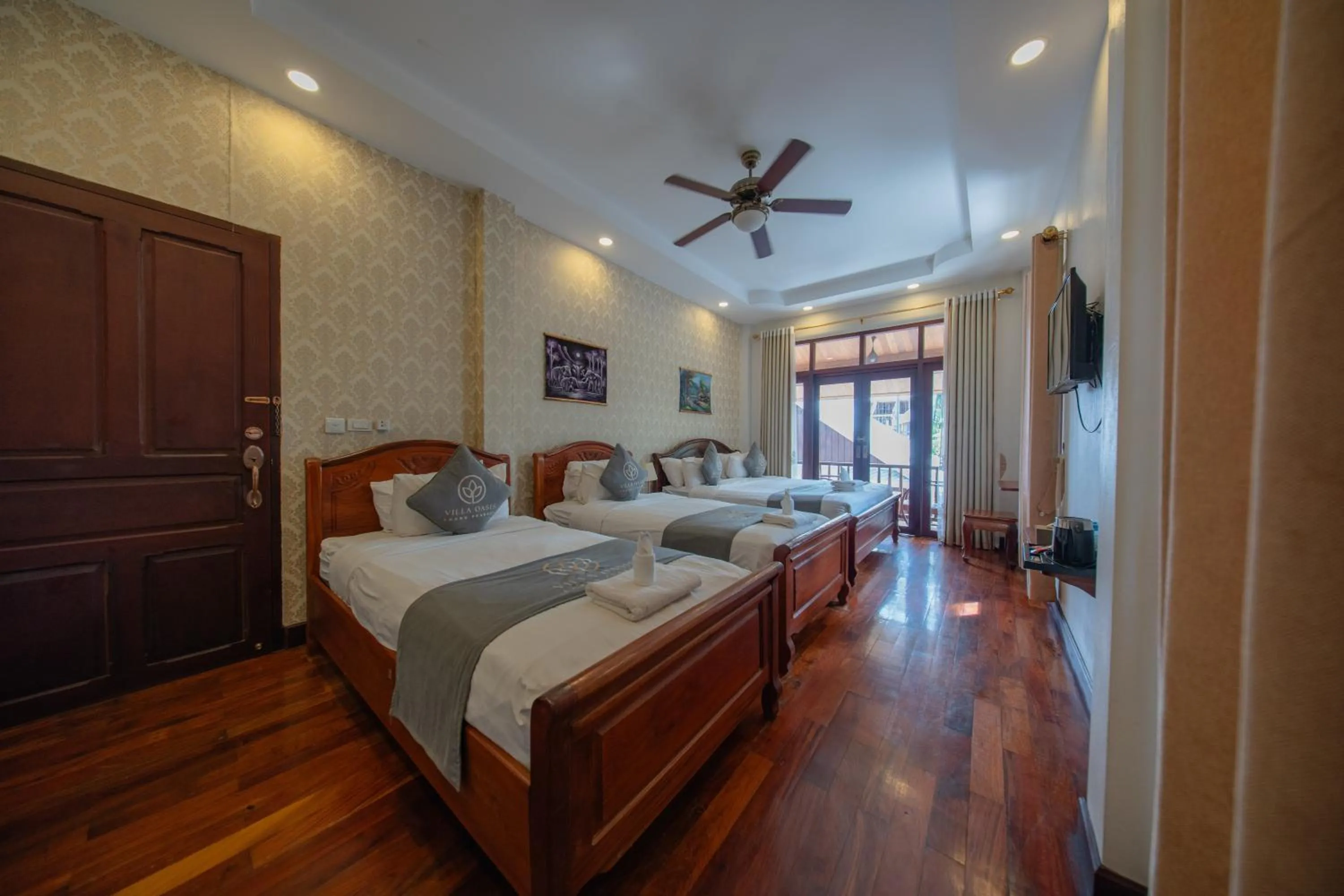 Photo of the whole room, Bed in Villa Oasis Luang Prabang