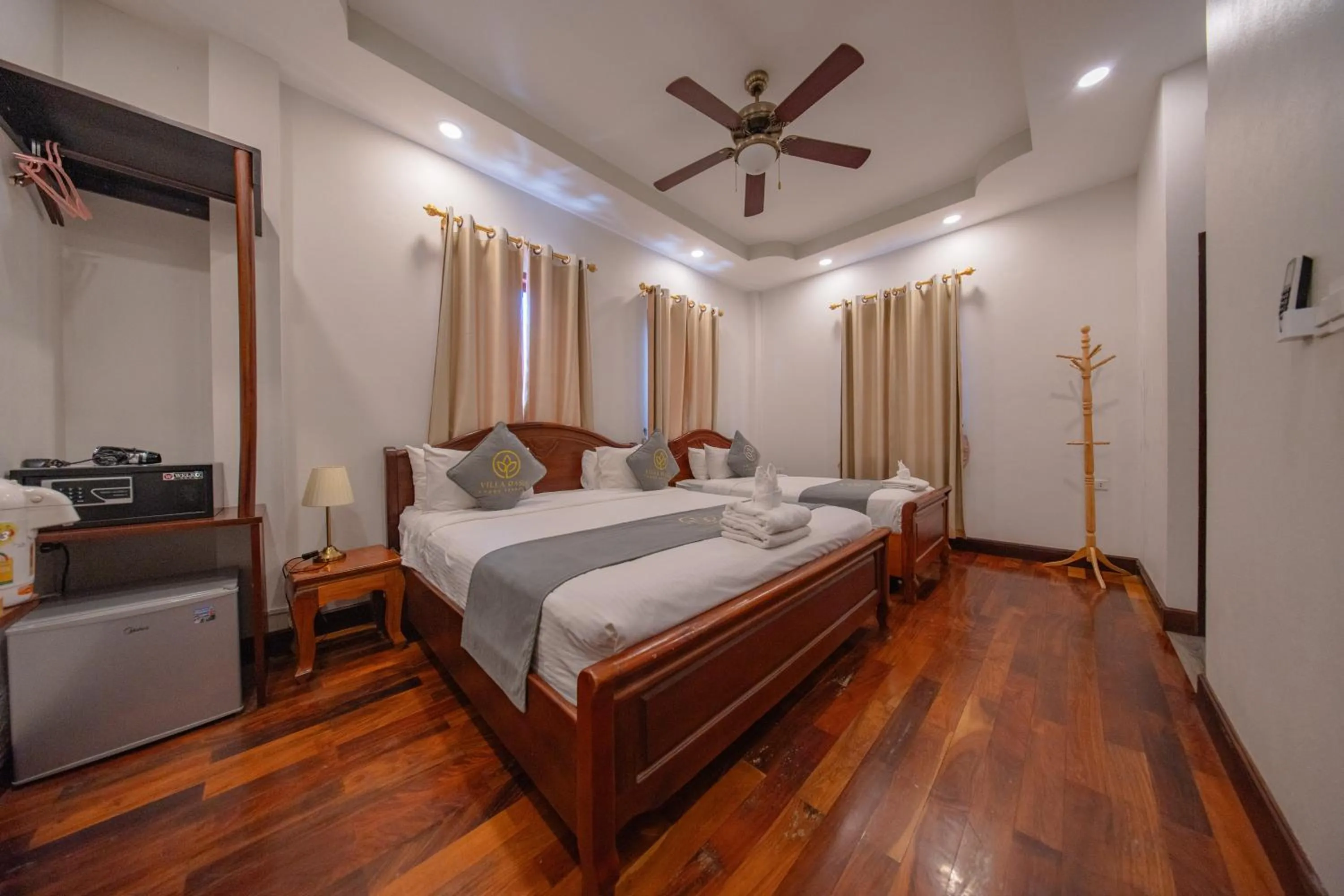 Photo of the whole room, Bed in Villa Oasis Luang Prabang
