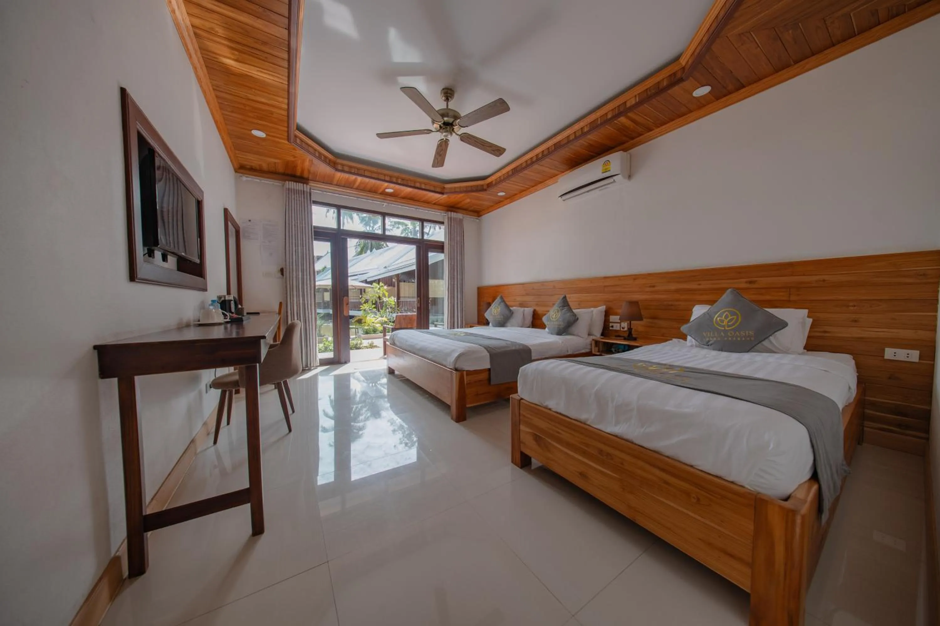 Photo of the whole room, Bed in Villa Oasis Luang Prabang