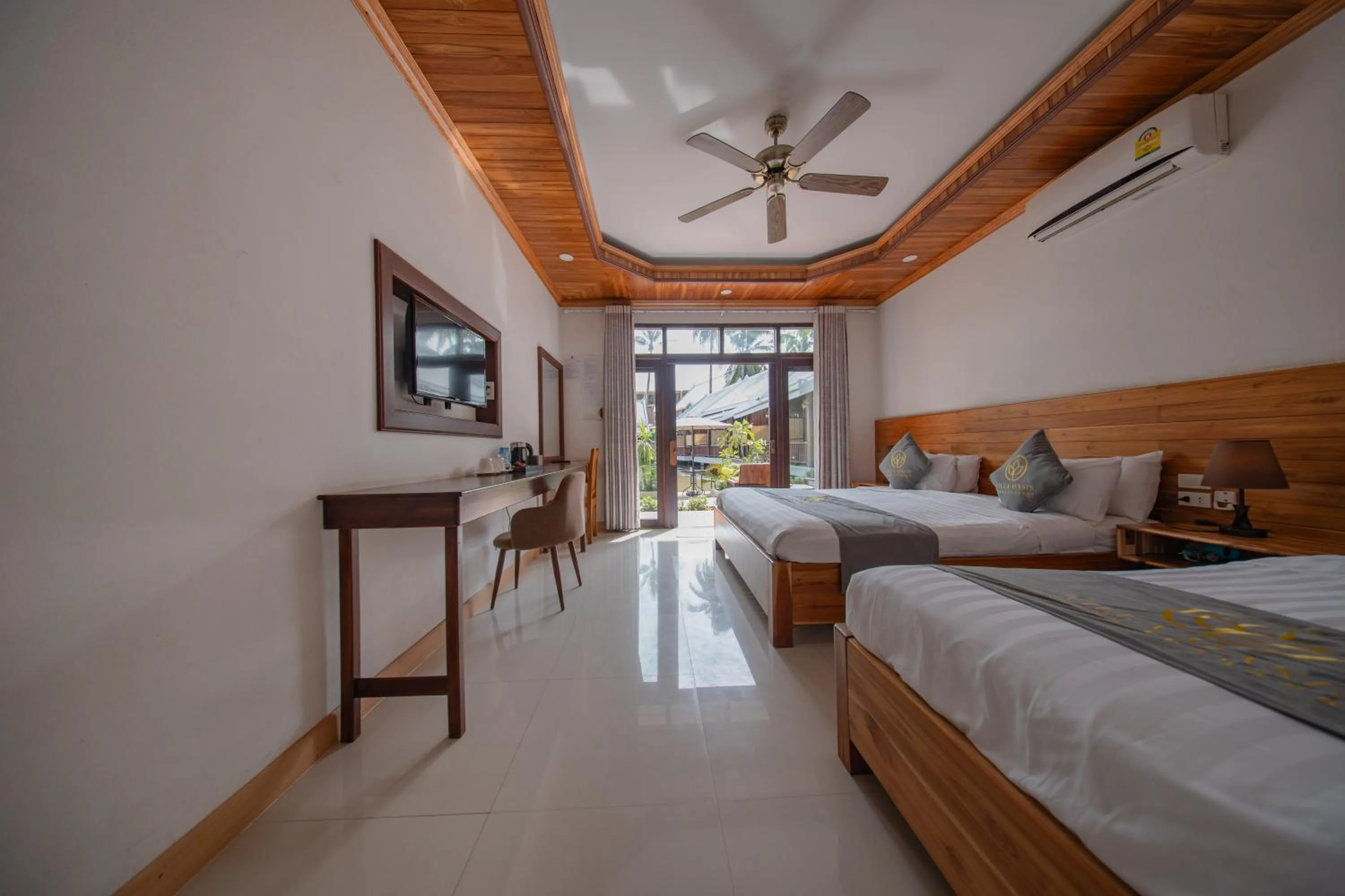 Photo of the whole room, Bed in Villa Oasis Luang Prabang