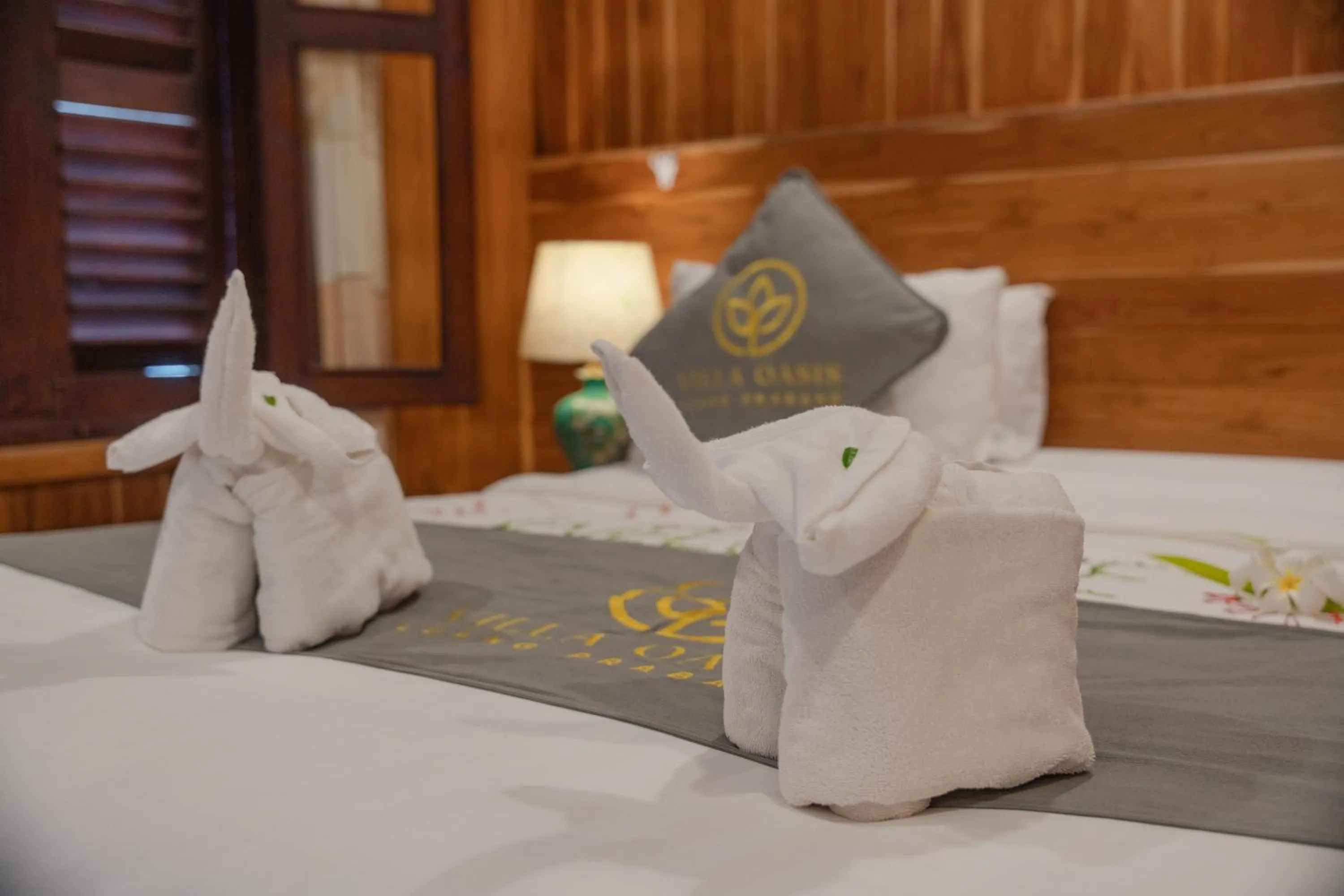 Bed in Villa Oasis Luang Prabang