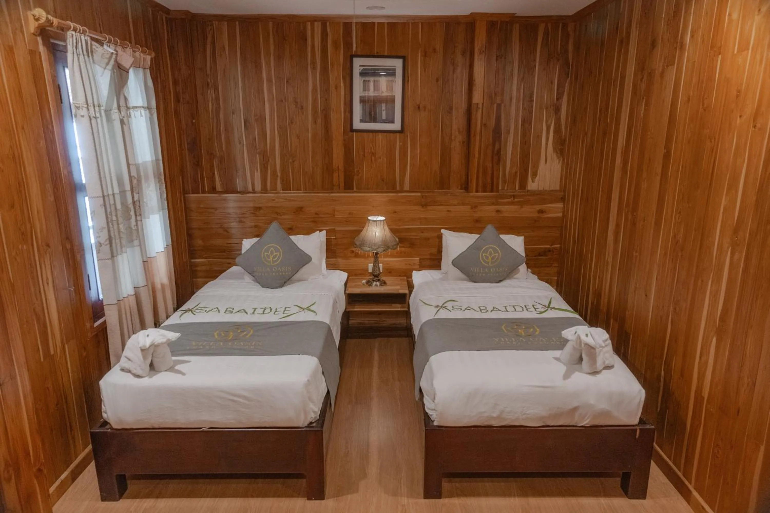 Photo of the whole room, Bed in Villa Oasis Luang Prabang
