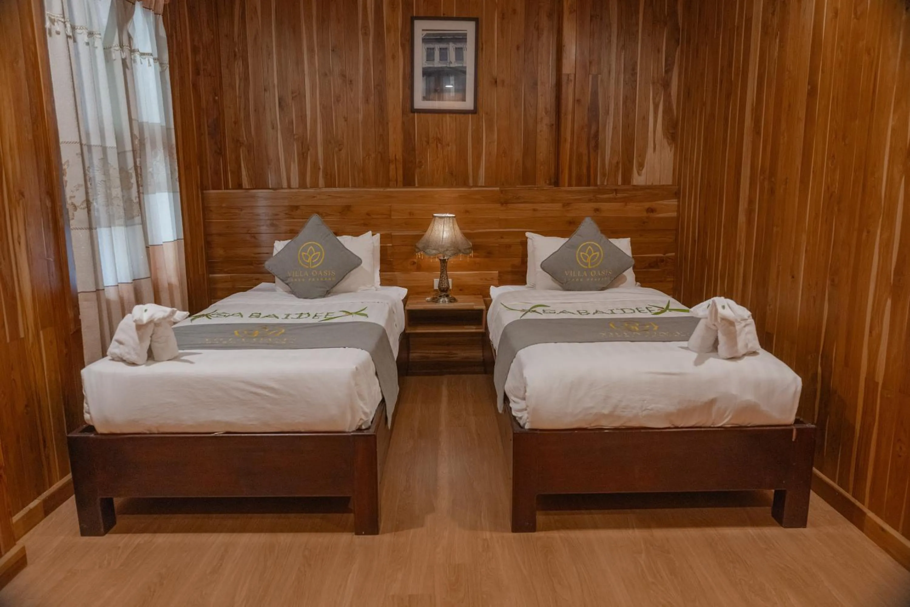 Photo of the whole room, Bed in Villa Oasis Luang Prabang