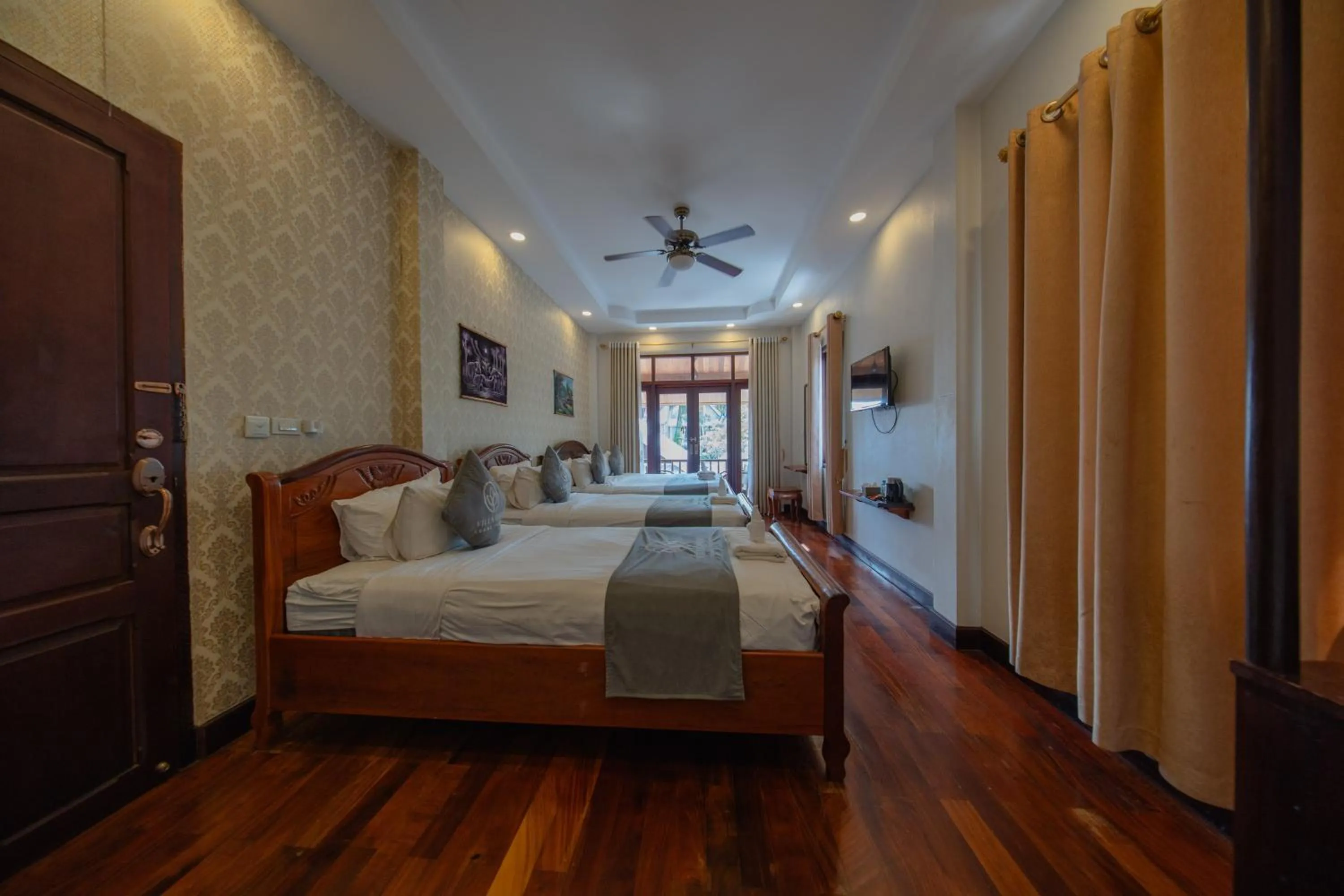 Photo of the whole room, Bed in Villa Oasis Luang Prabang