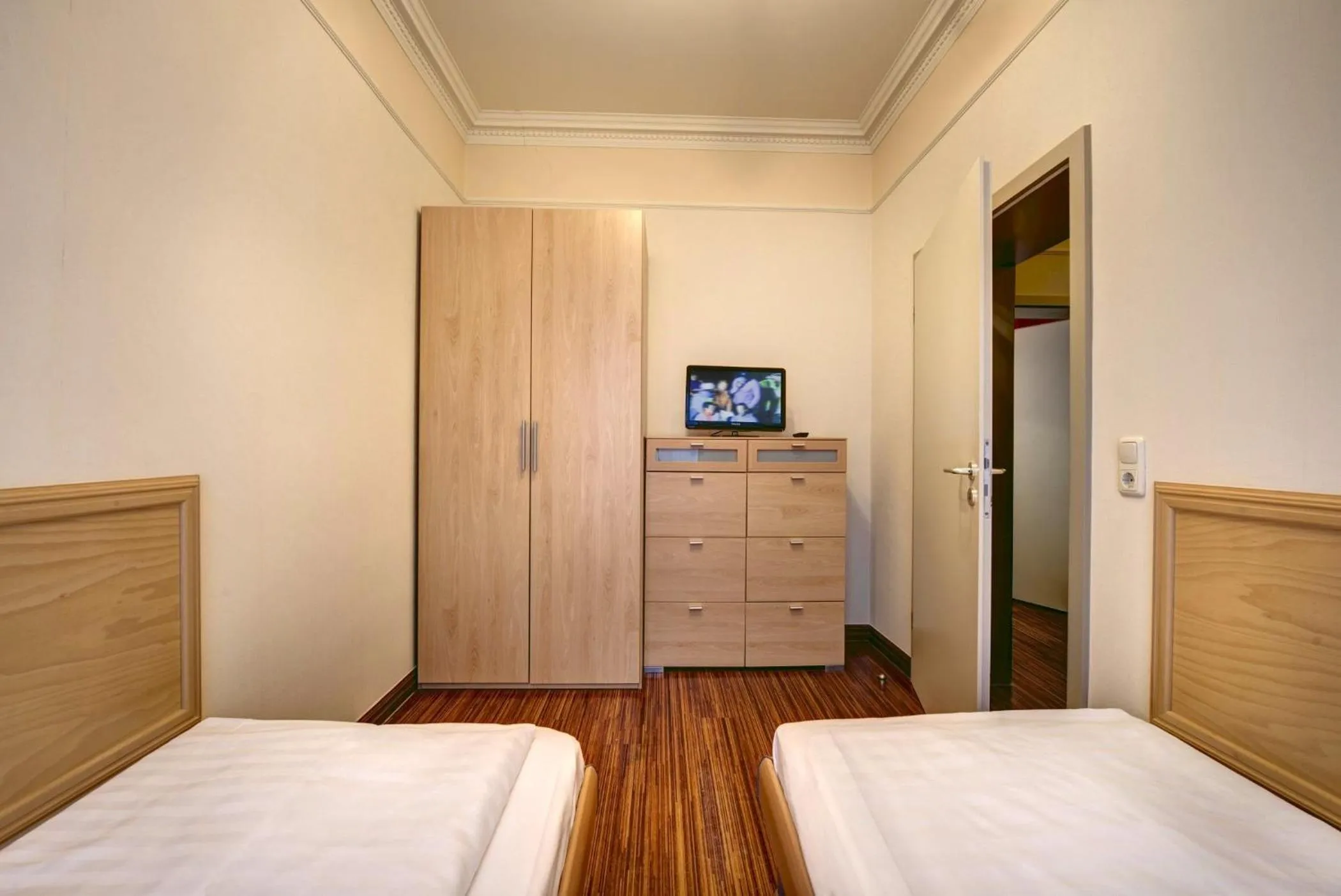 Photo of the whole room, Bed in Strandhotel Nordischer Hof