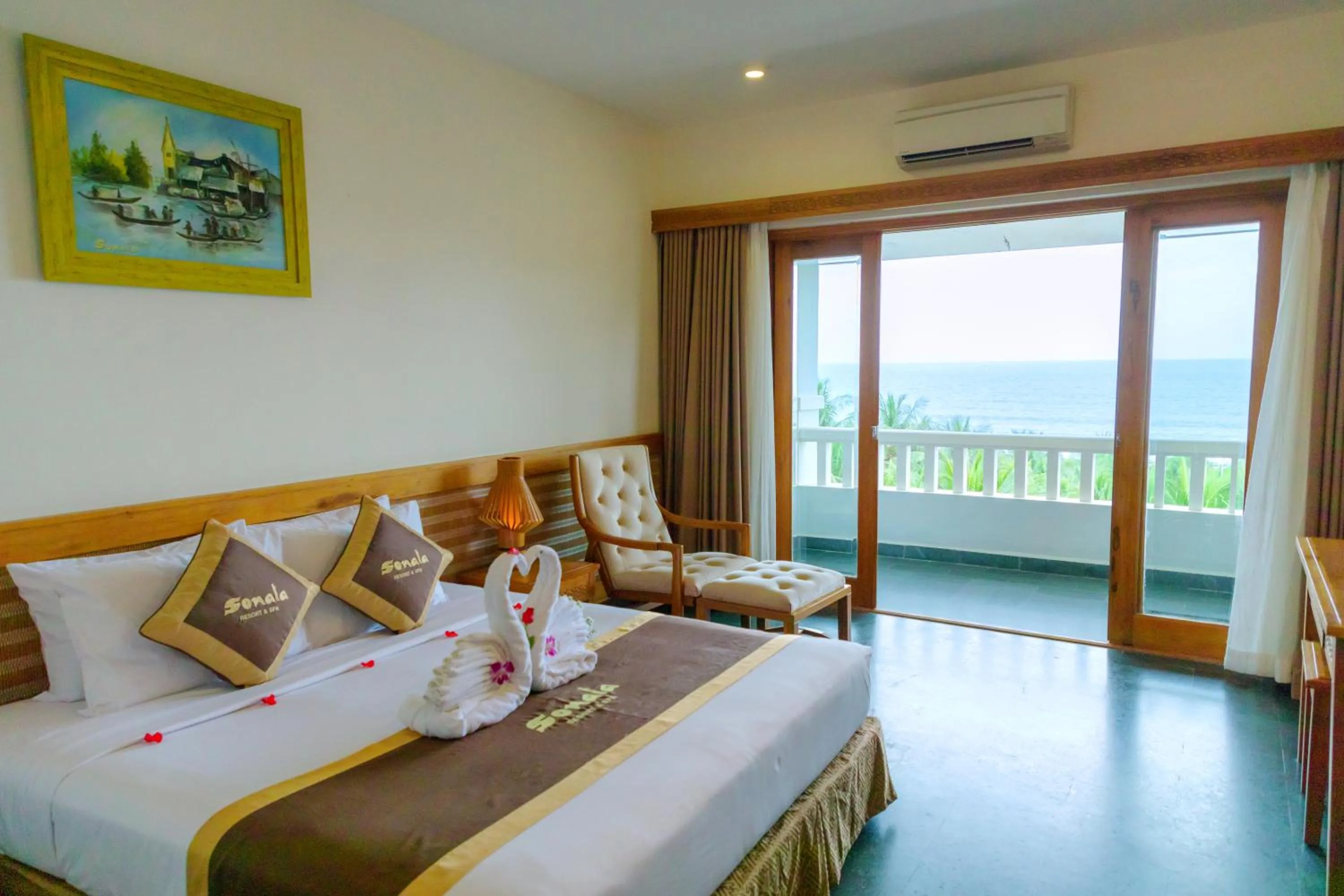 Bed in Sonata Resort & Spa