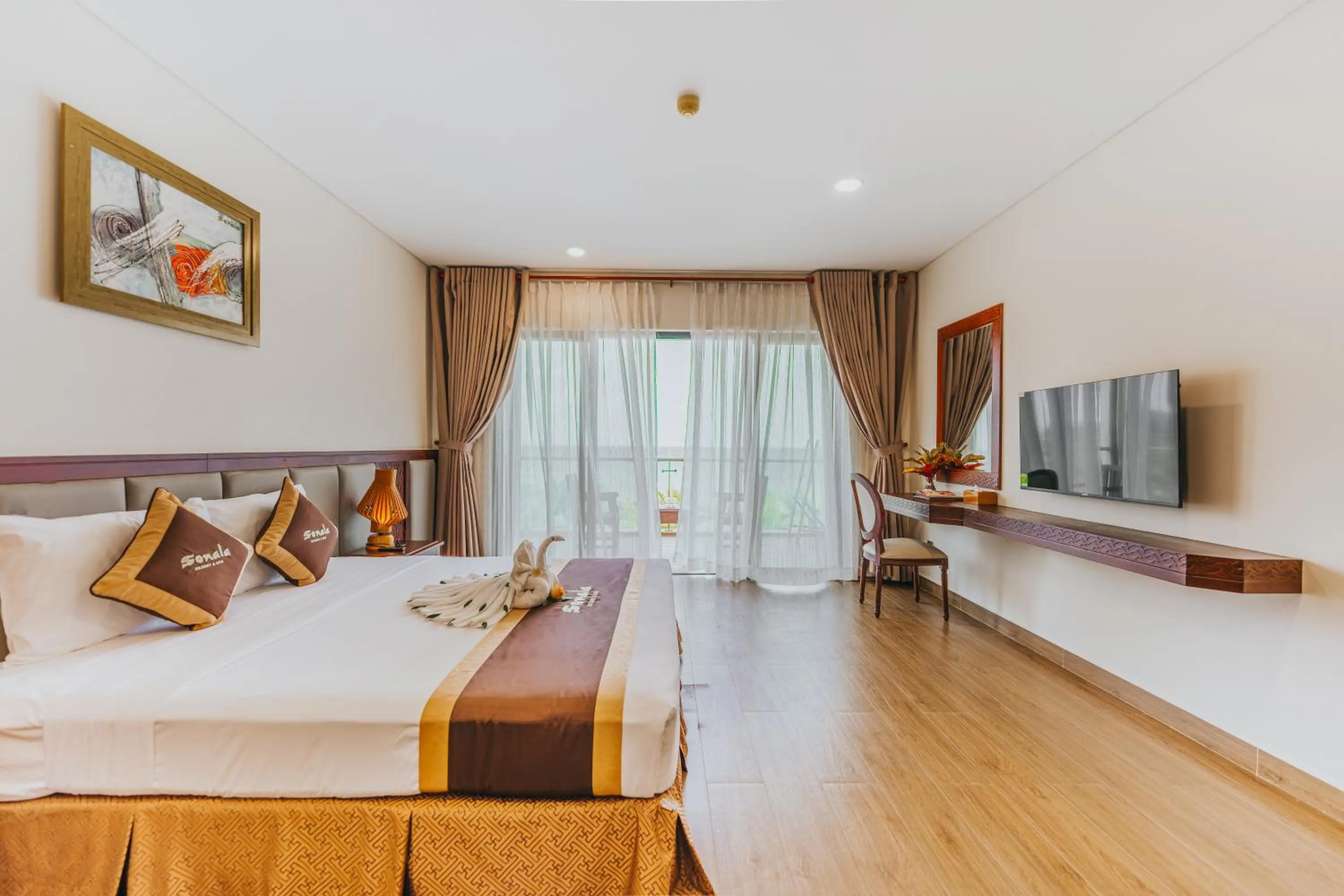 Bed in Sonata Resort & Spa