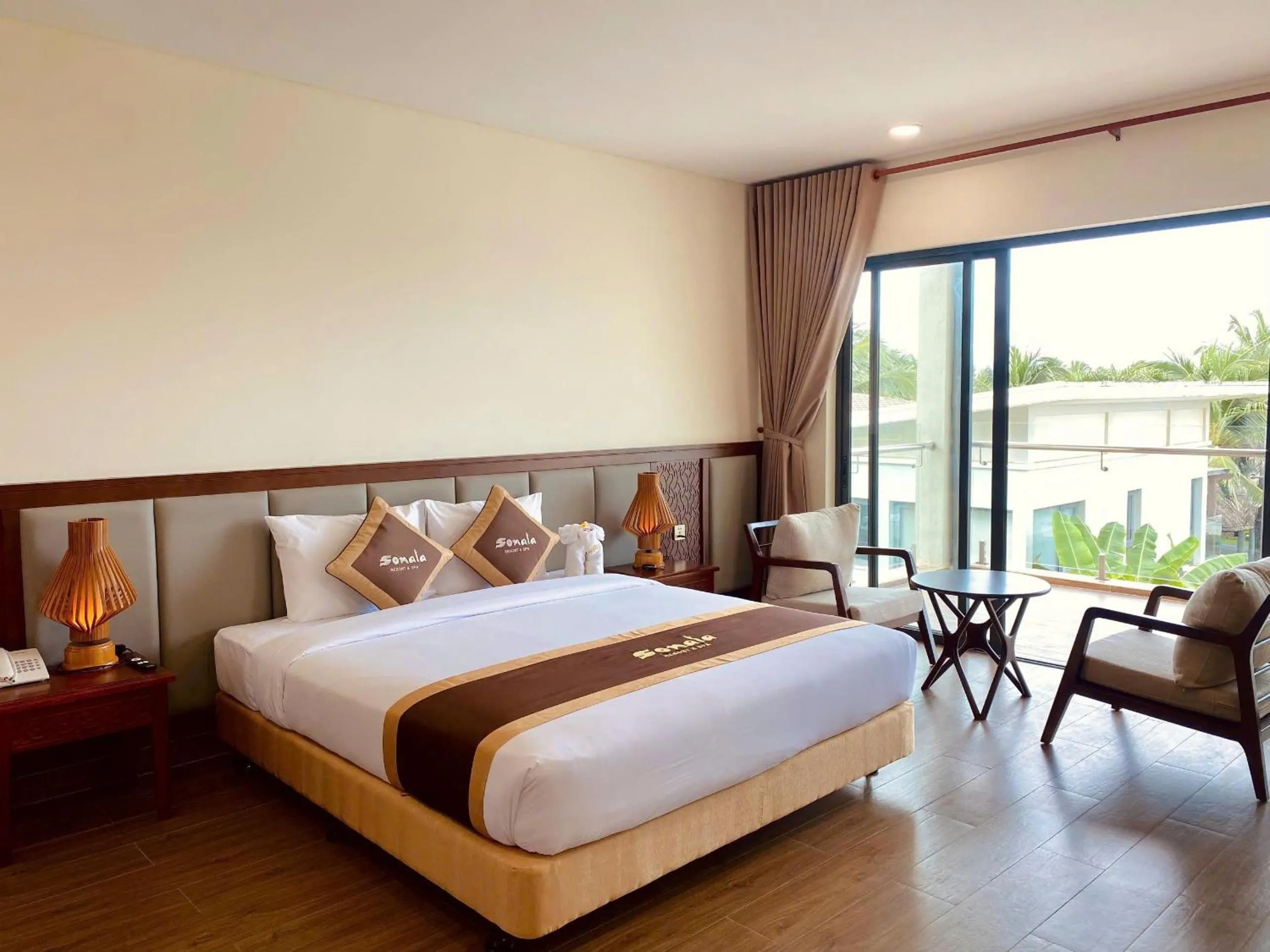 Bed in Sonata Resort & Spa