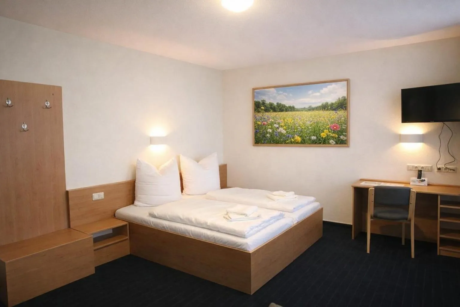 Photo of the whole room, Bed in City-Pension Magdeburg