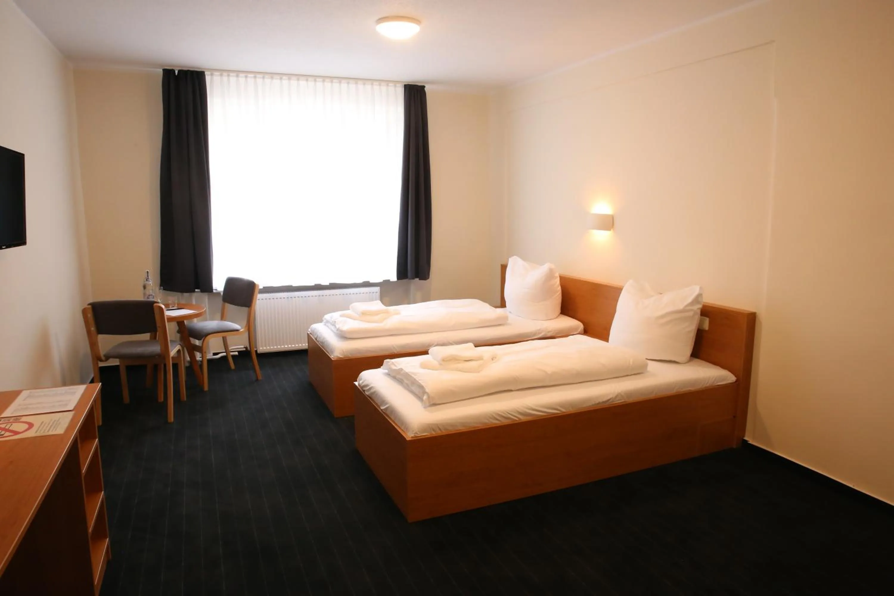 Photo of the whole room, Bed in City-Pension Magdeburg