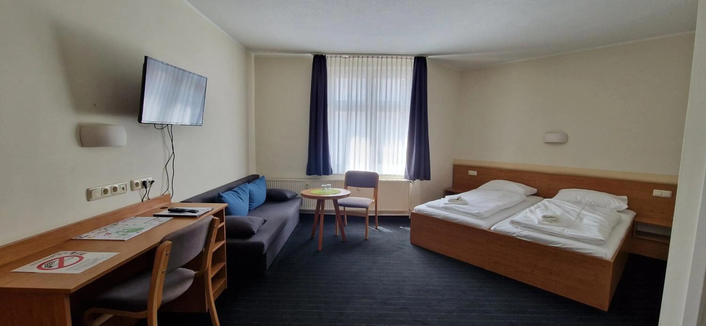 Bed in City-Pension Magdeburg