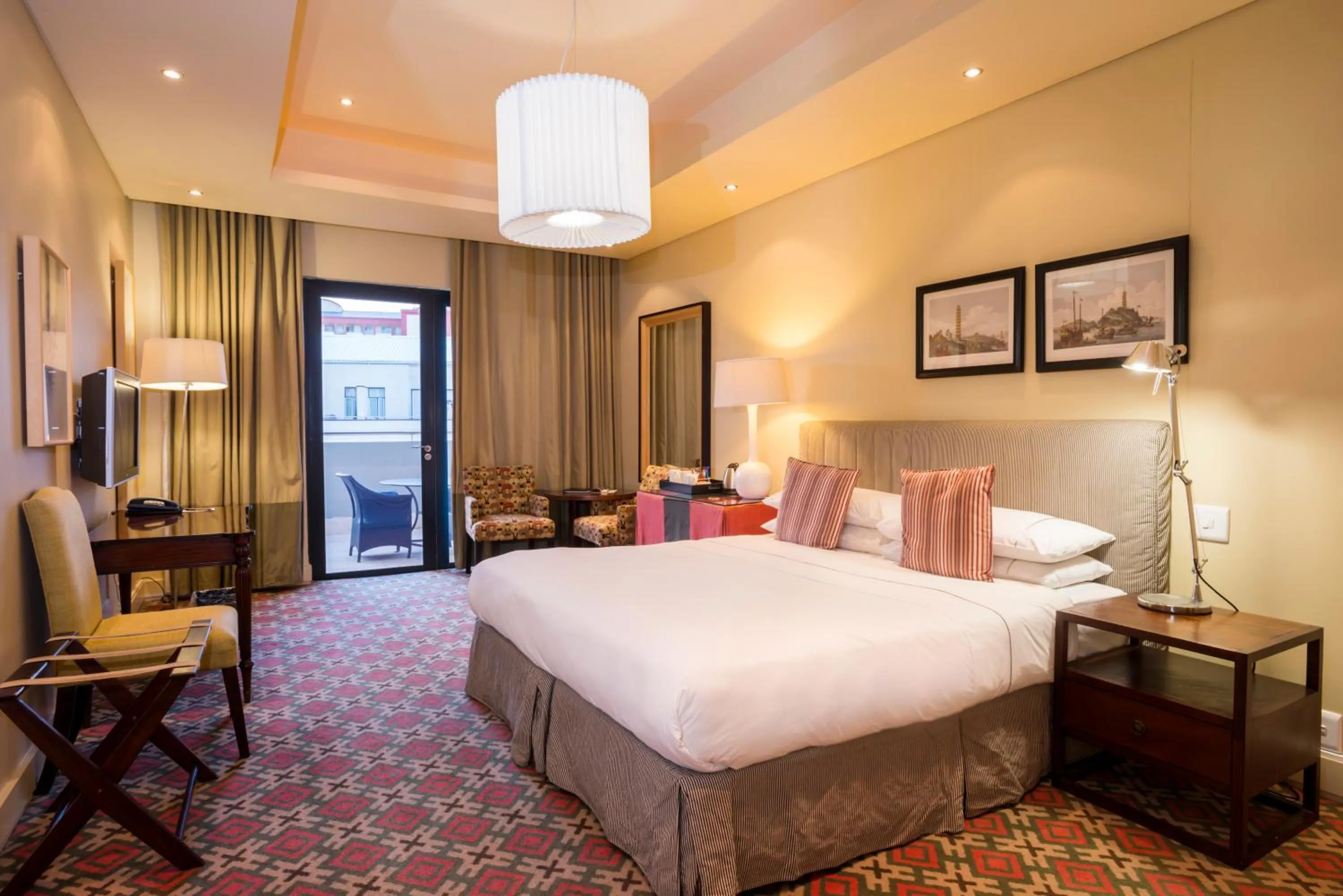 Bed in Royal Palm Hotel