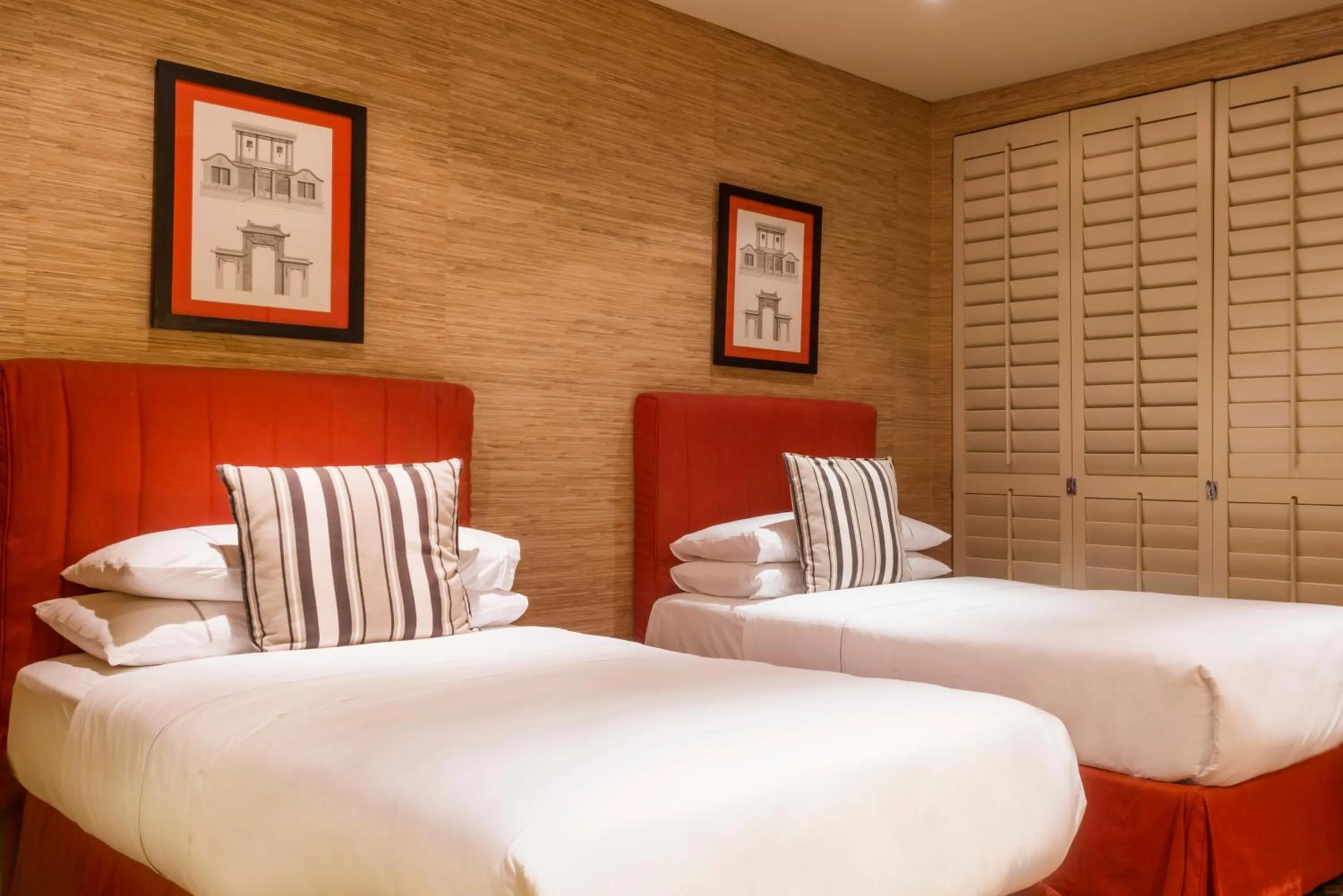 Bed in Royal Palm Hotel