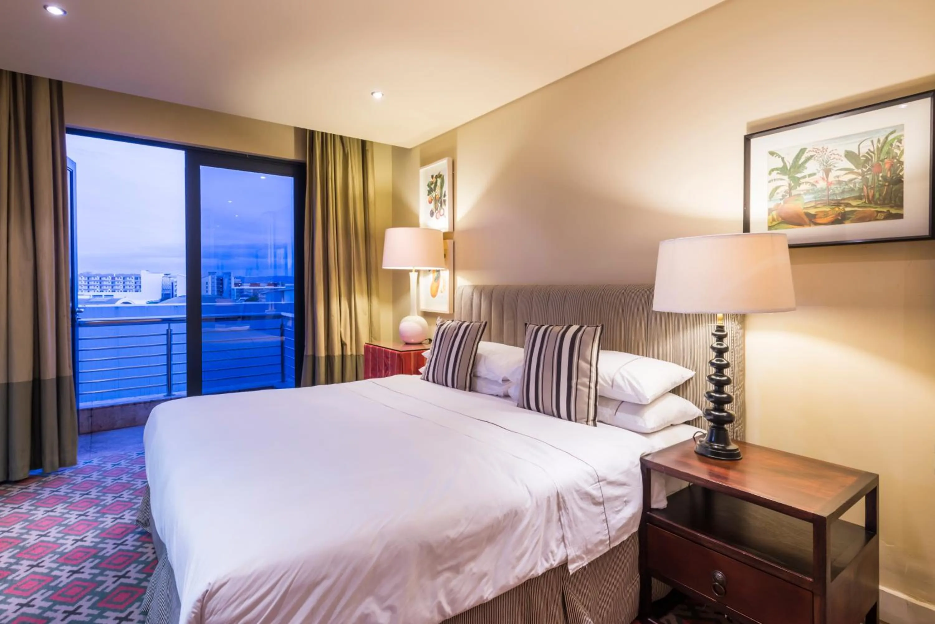 Bed in Royal Palm Hotel