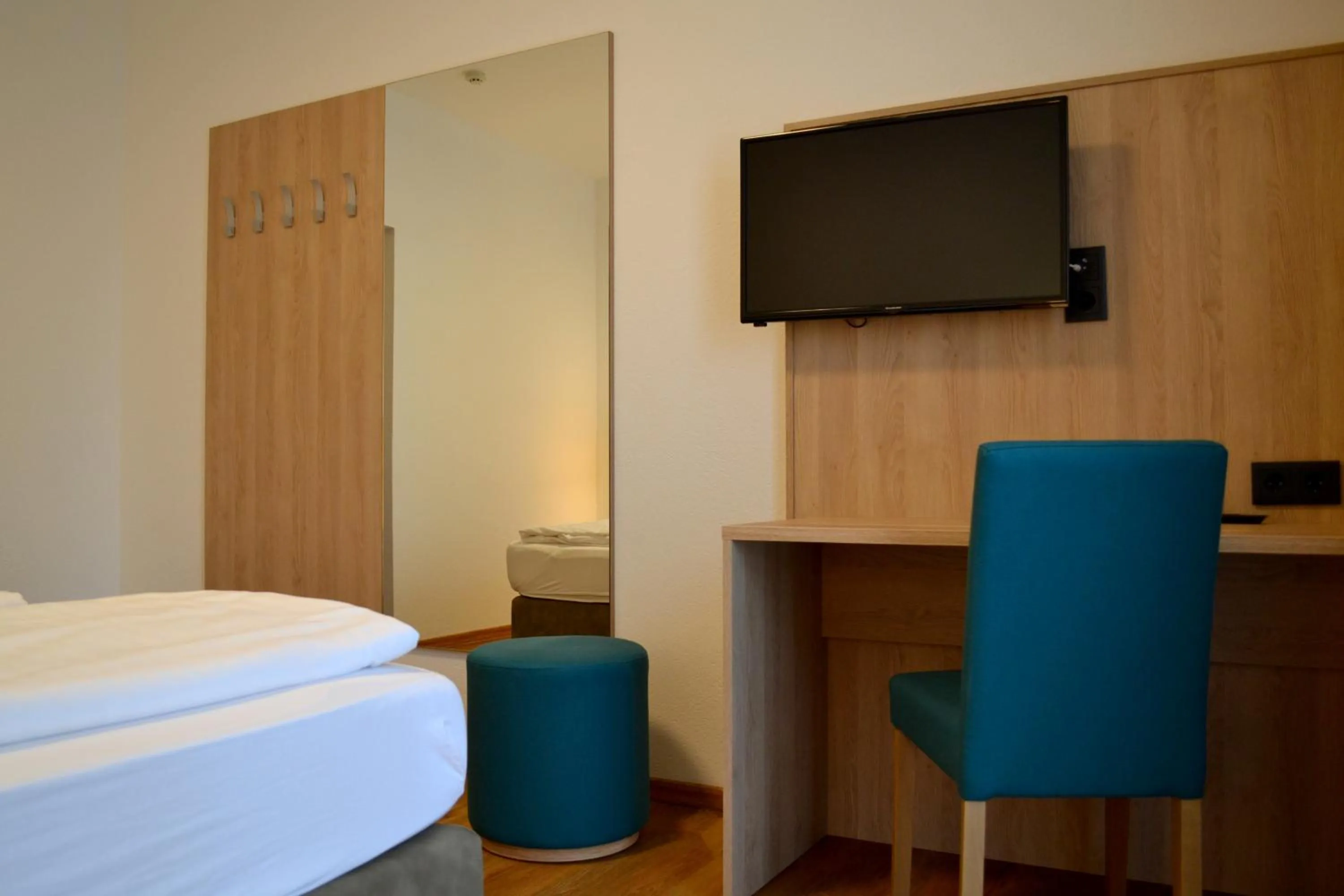 TV and multimedia, Bed in Gasthof Kranerwirt