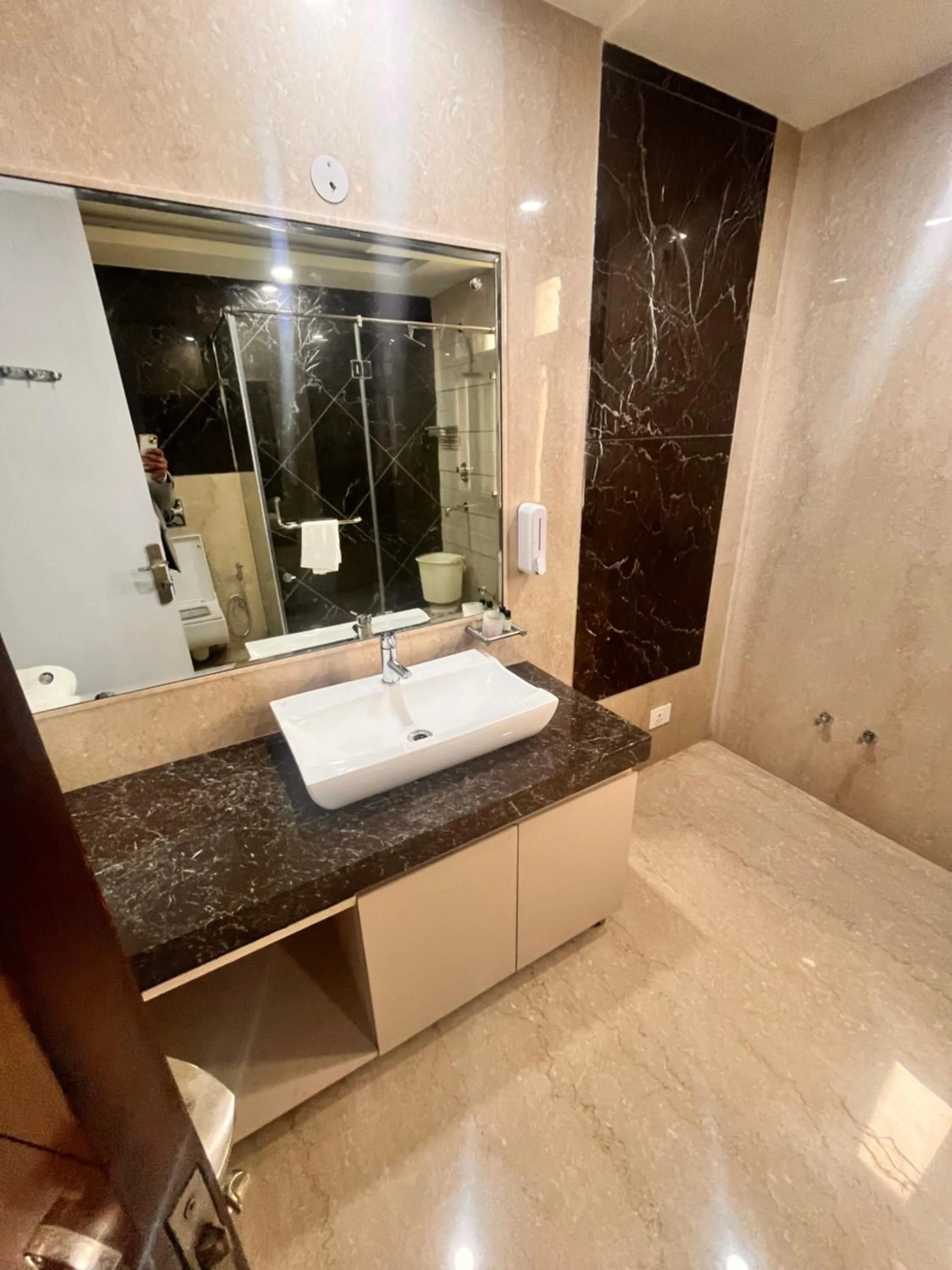 Toilet, Bed in Gazebo Inn & Suites Medanta