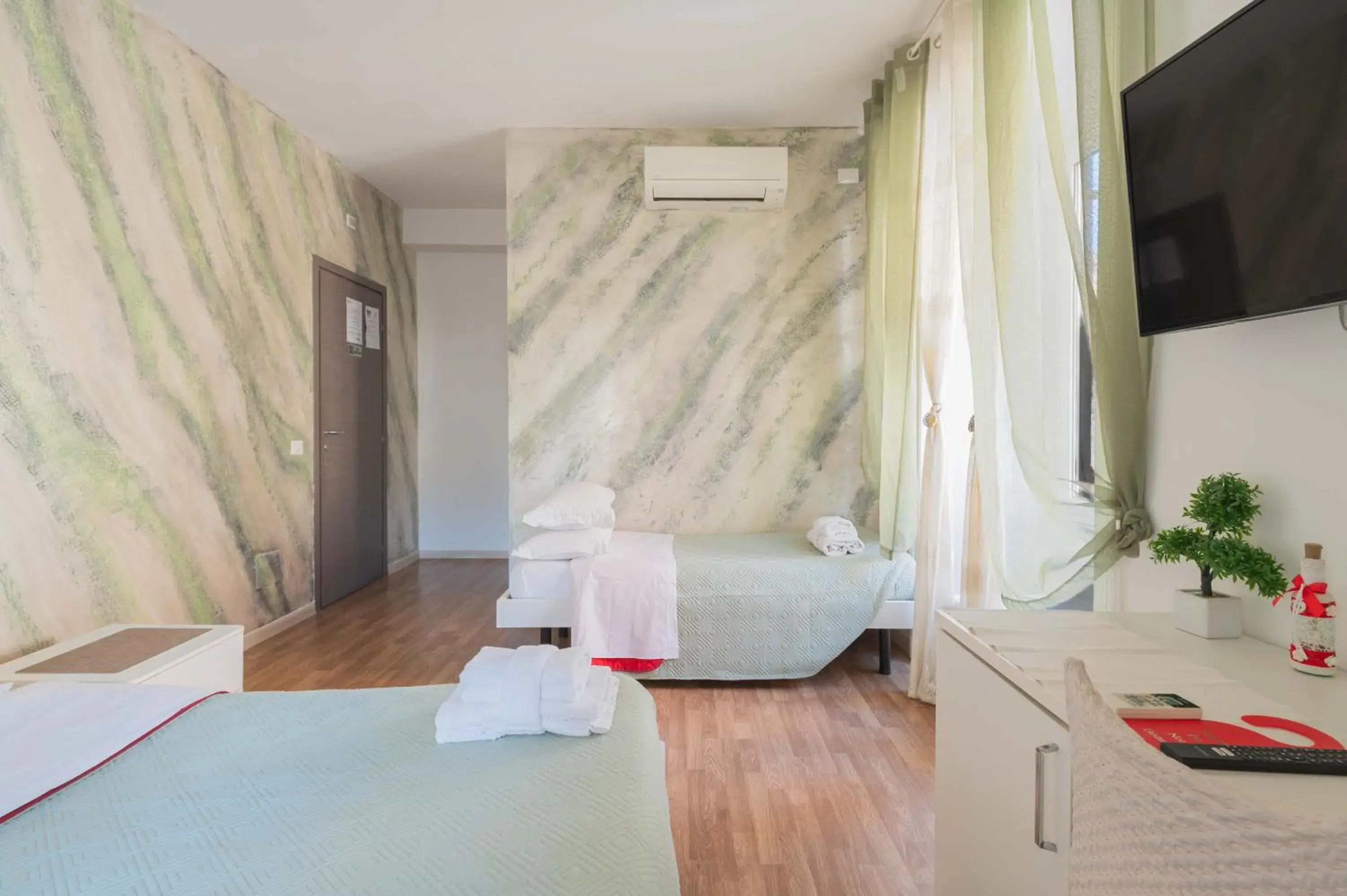 Bed in Rione Monti Suites Bed in Rione Monti Suites