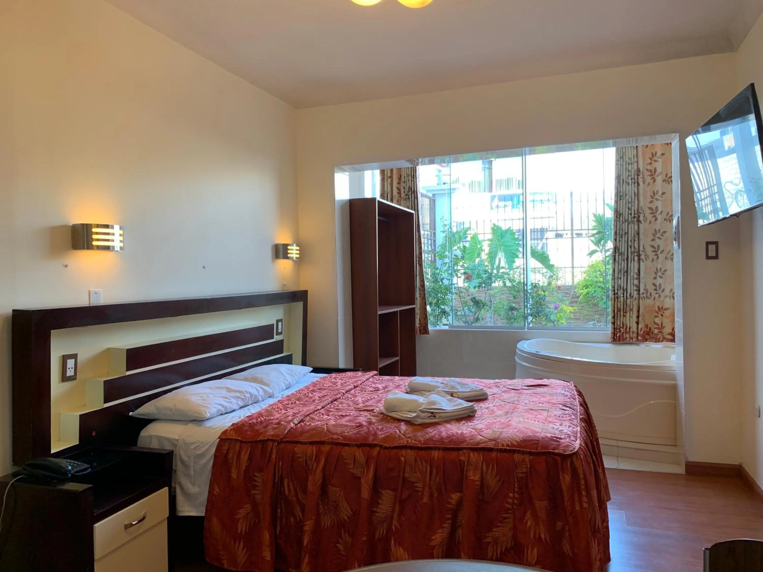 Bed in Hotel La Mansion