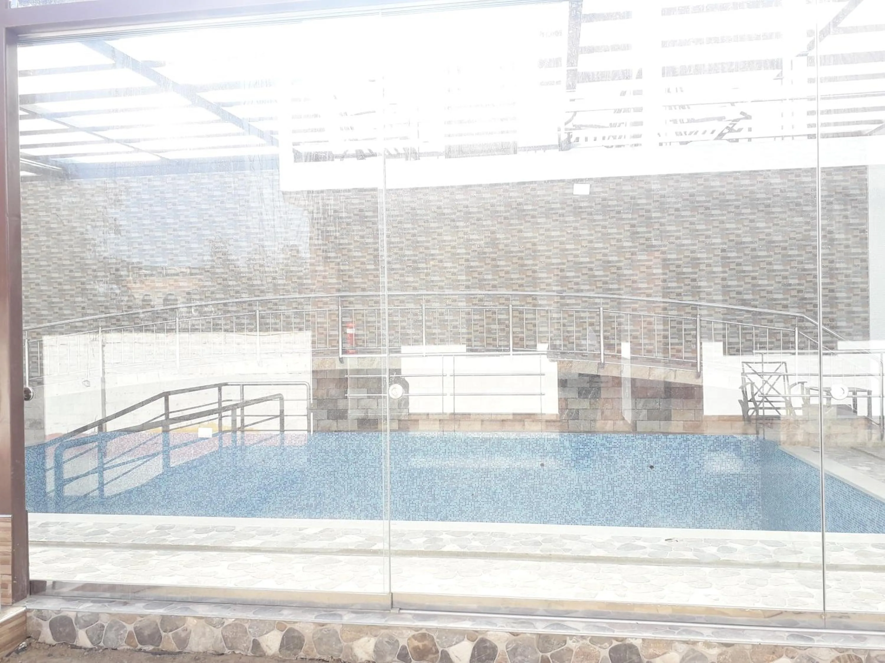 Swimming pool in Hotel La Mansion