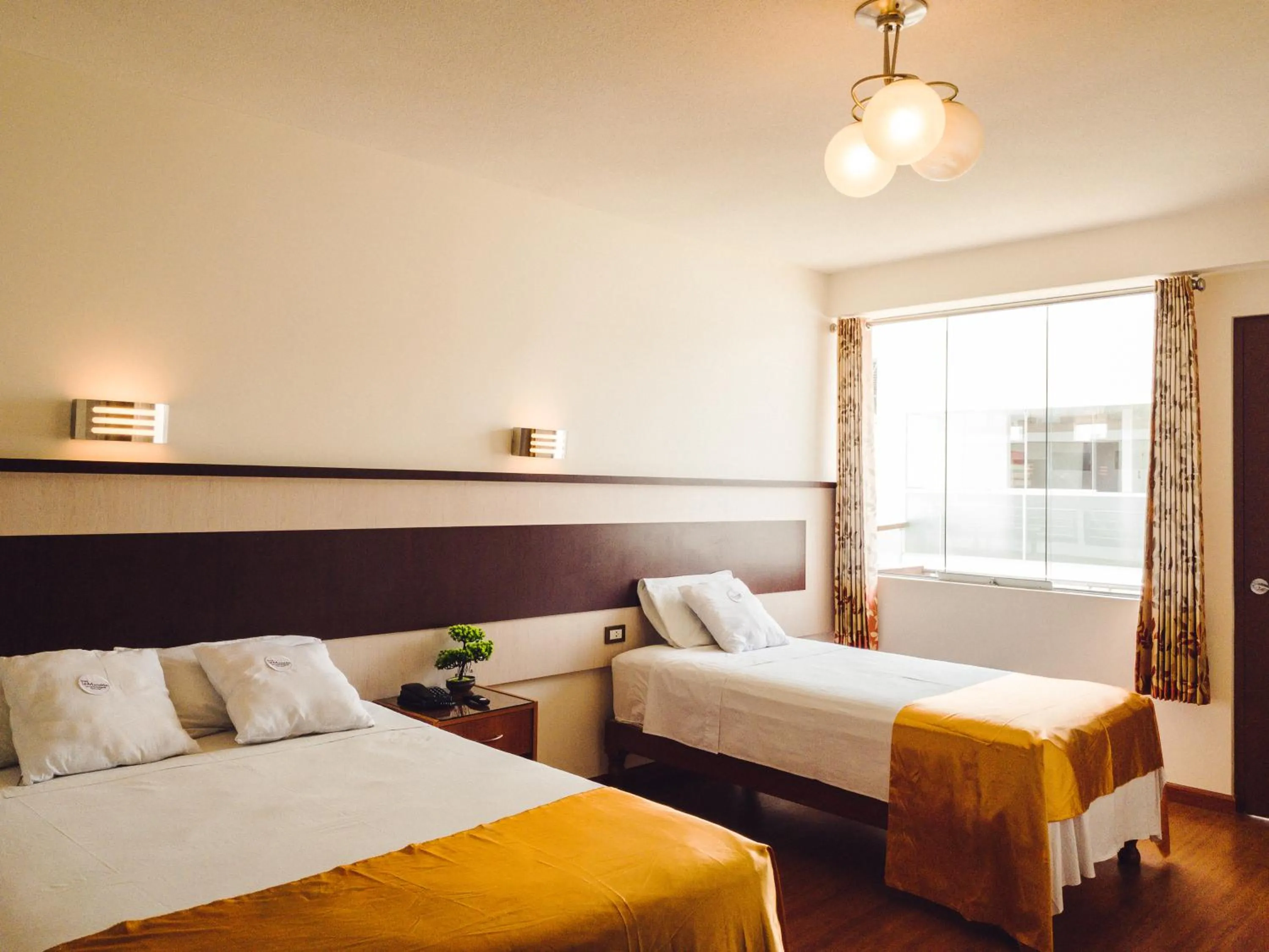 Bed in Hotel La Mansion