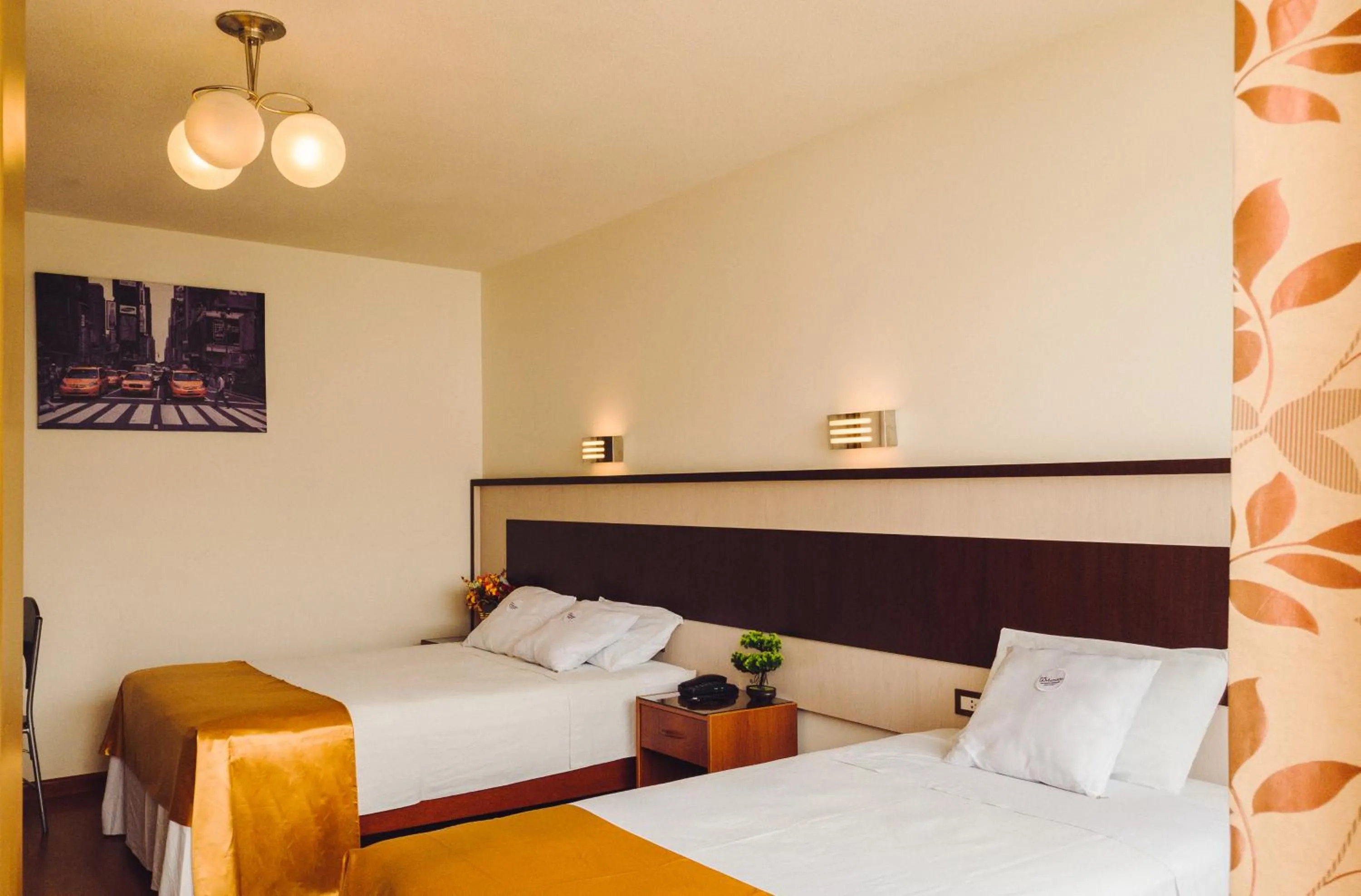 Bed in Hotel La Mansion