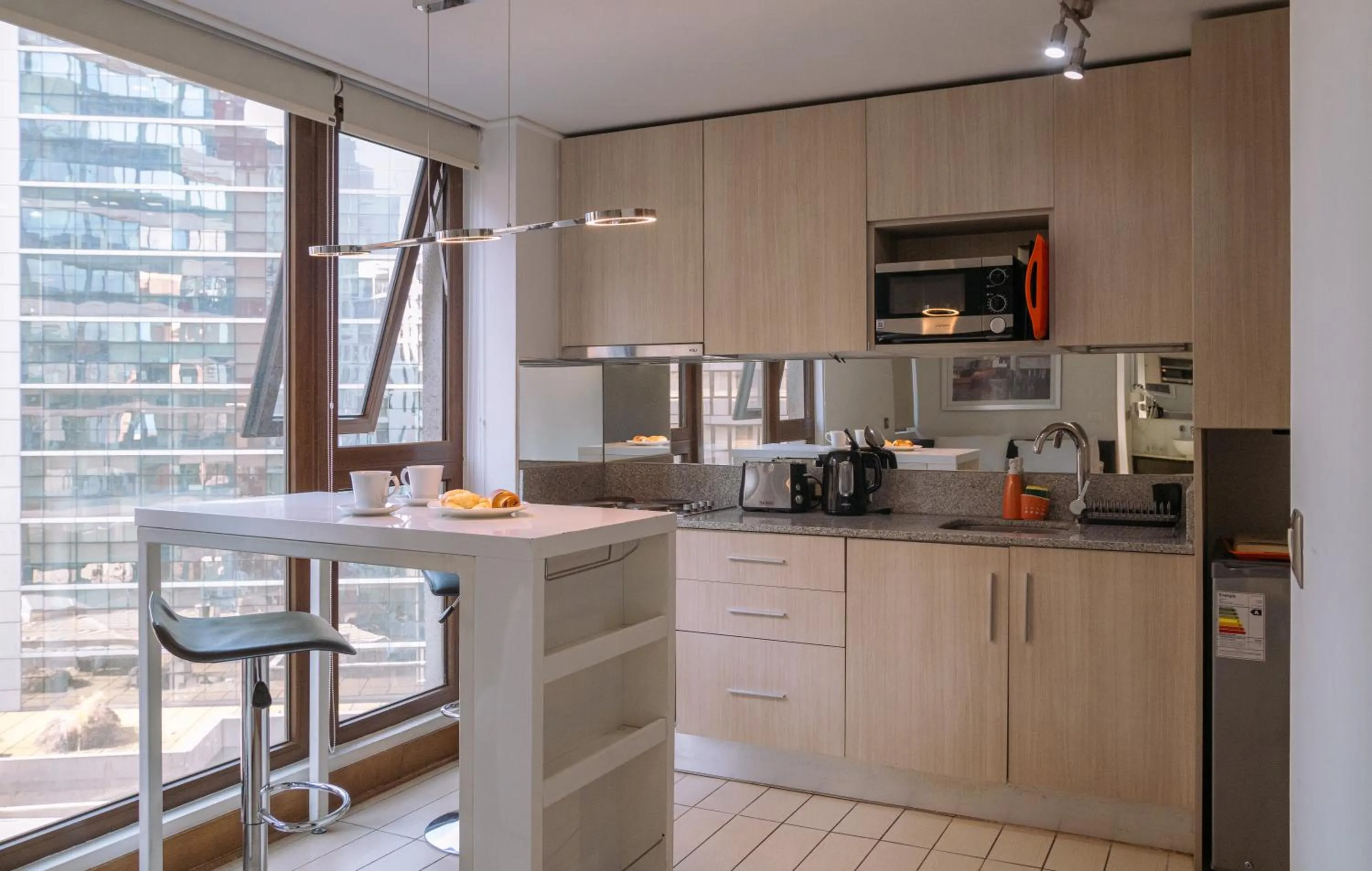 Kitchen or kitchenette in Sunset Aparts