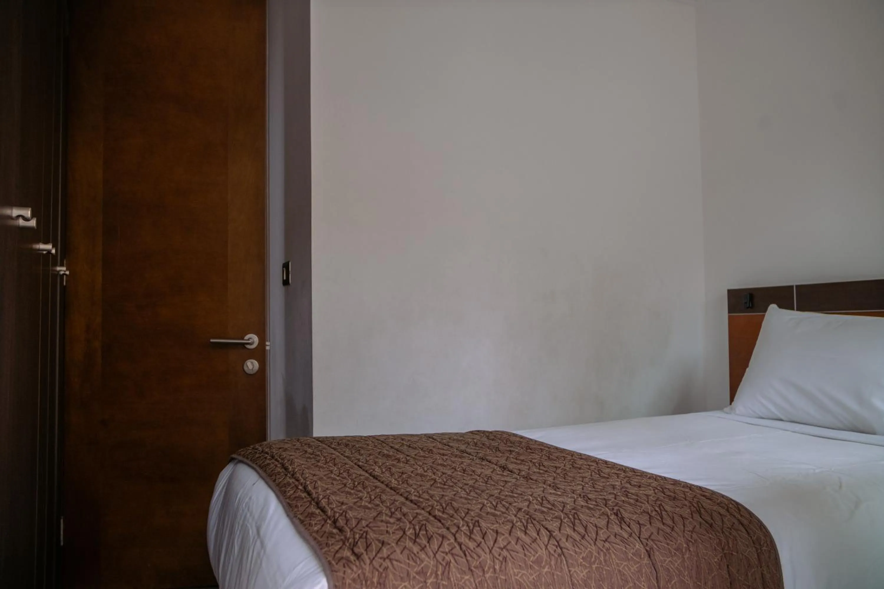 Bed in Sunset Aparts