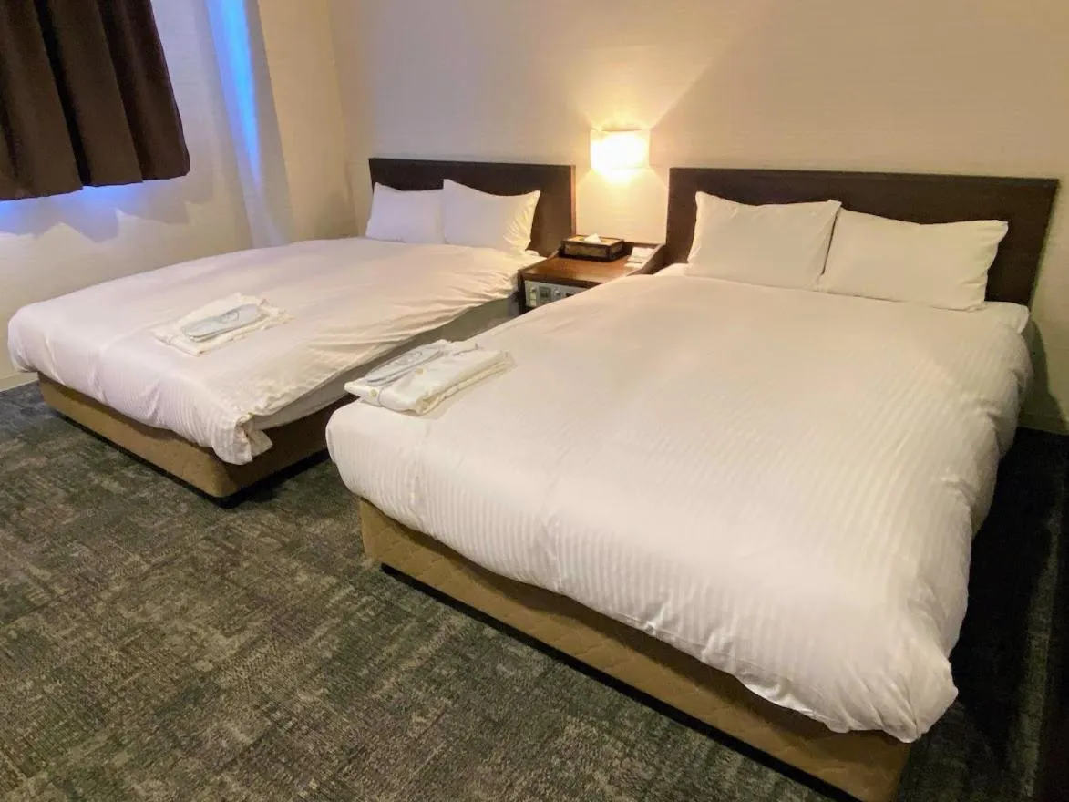 Bed in Blue Port Hotel Kitakyushu Airport