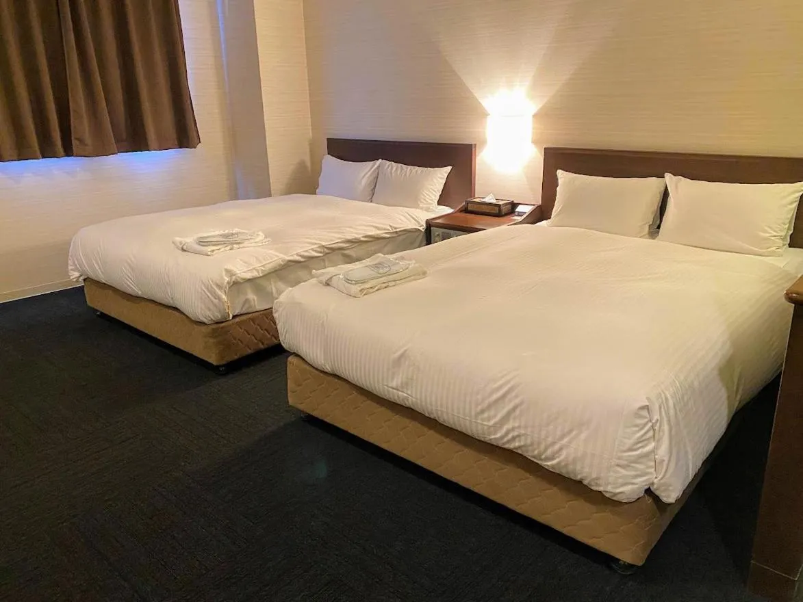 Bed in Blue Port Hotel Kitakyushu Airport