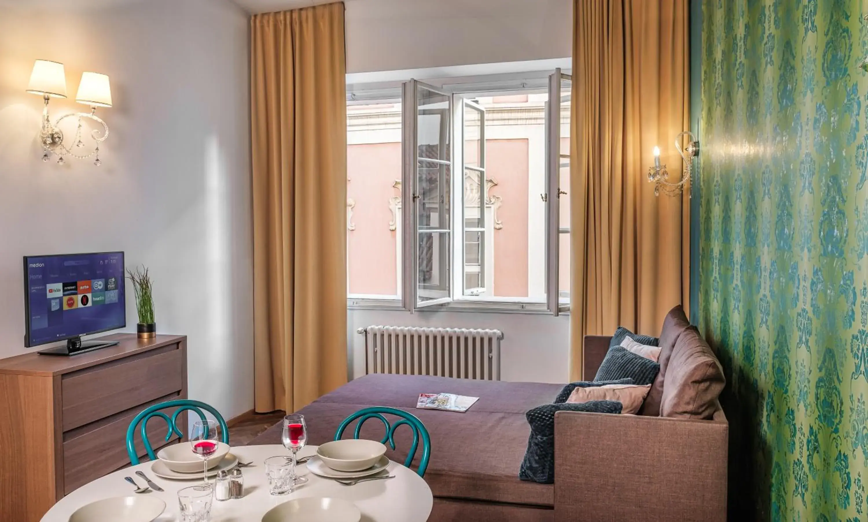 Living room in 7 Tales Apartments by Adrez Living room in 7 Tales Apartments by Adrez