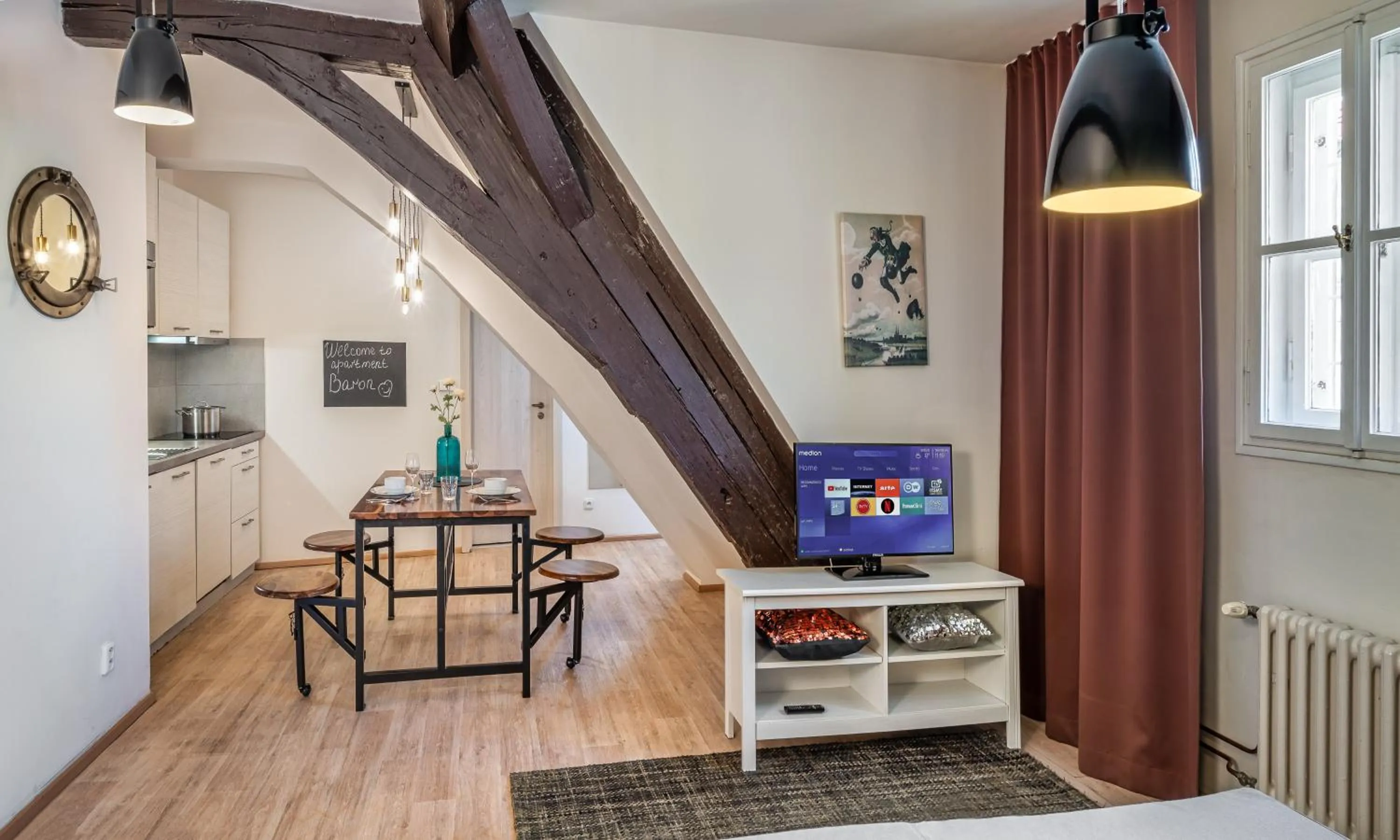 TV and multimedia in 7 Tales Apartments by Adrez