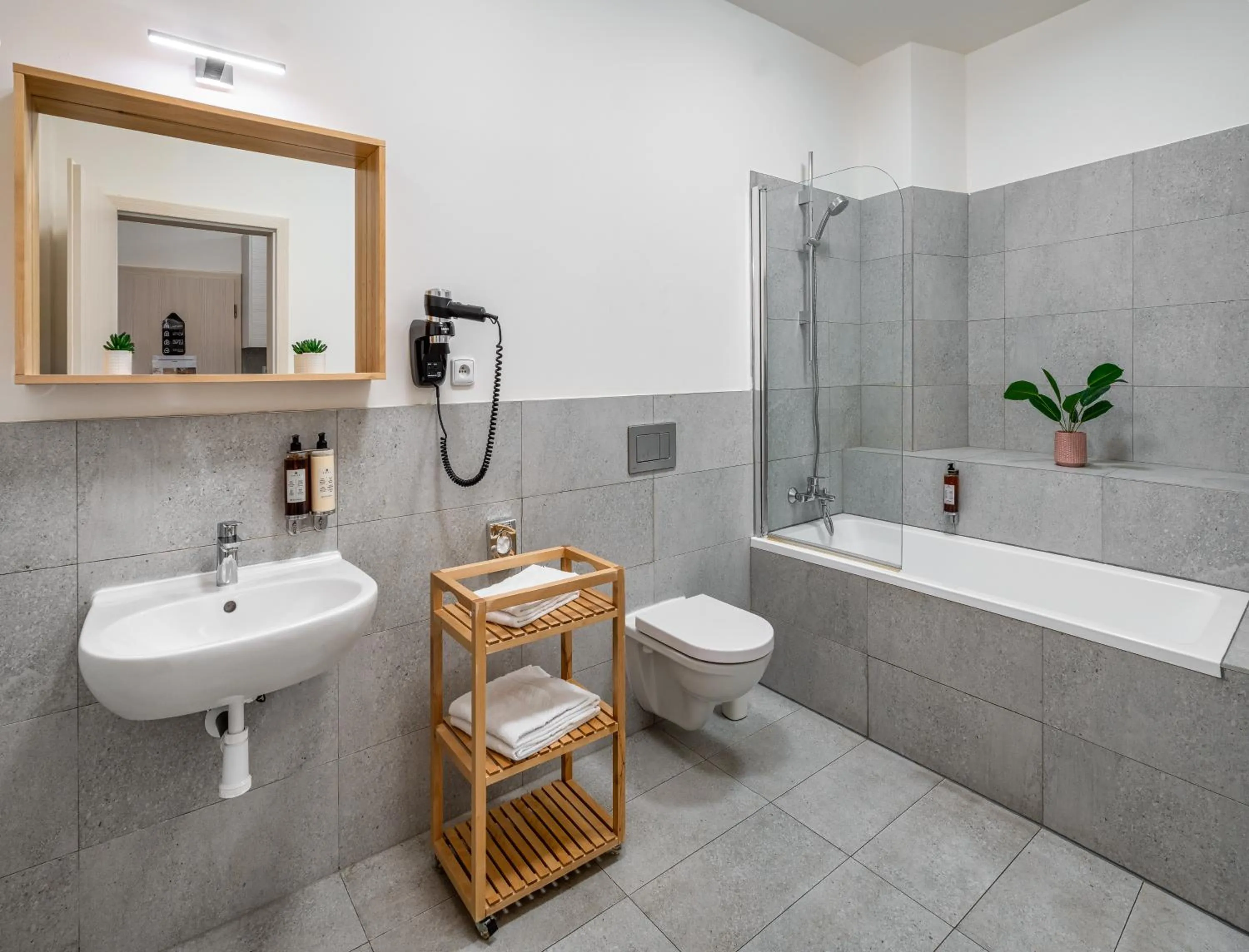 Bathroom in 7 Tales Apartments by Adrez