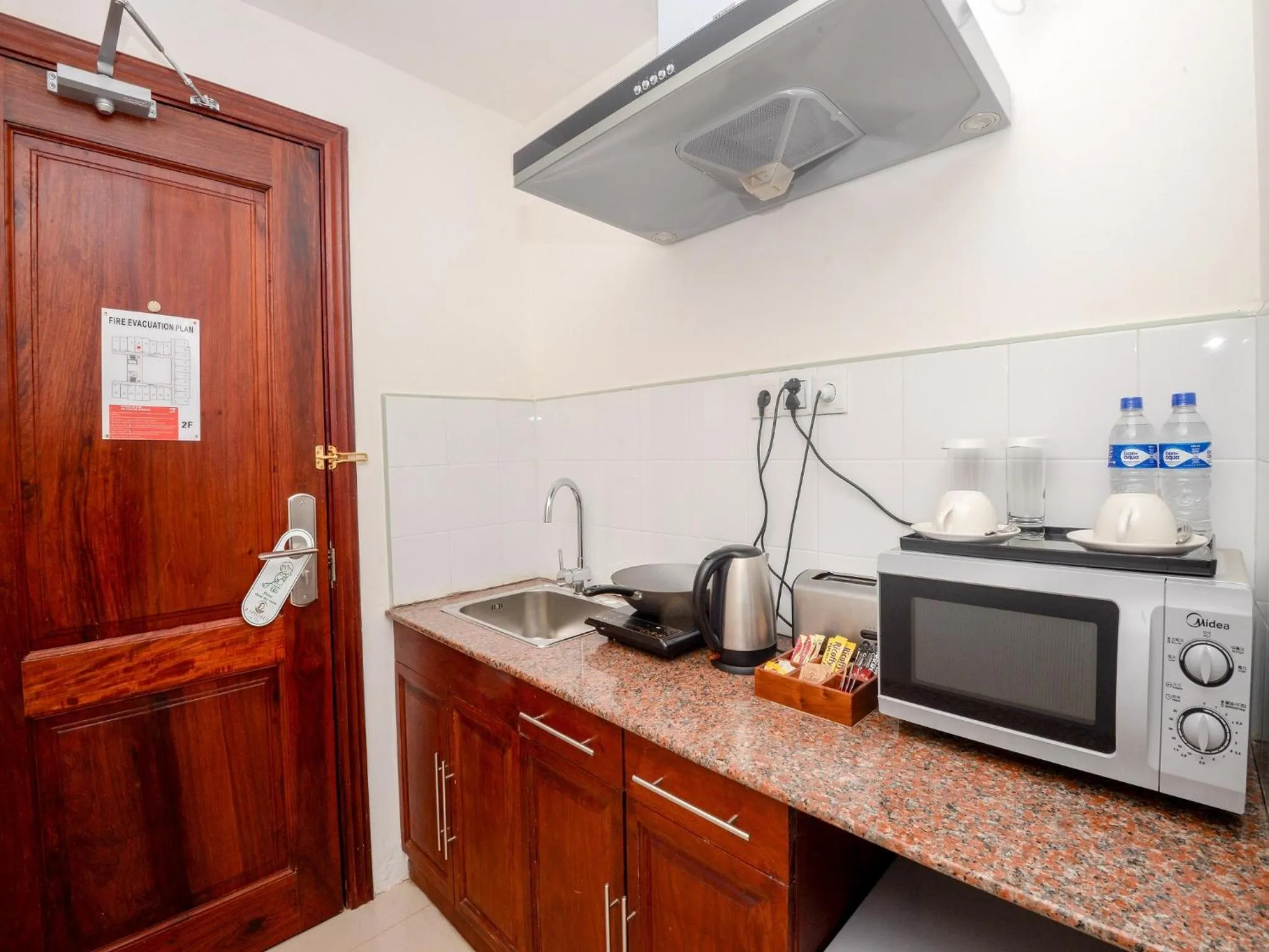 Kitchen or kitchenette in Raphael's Hotel