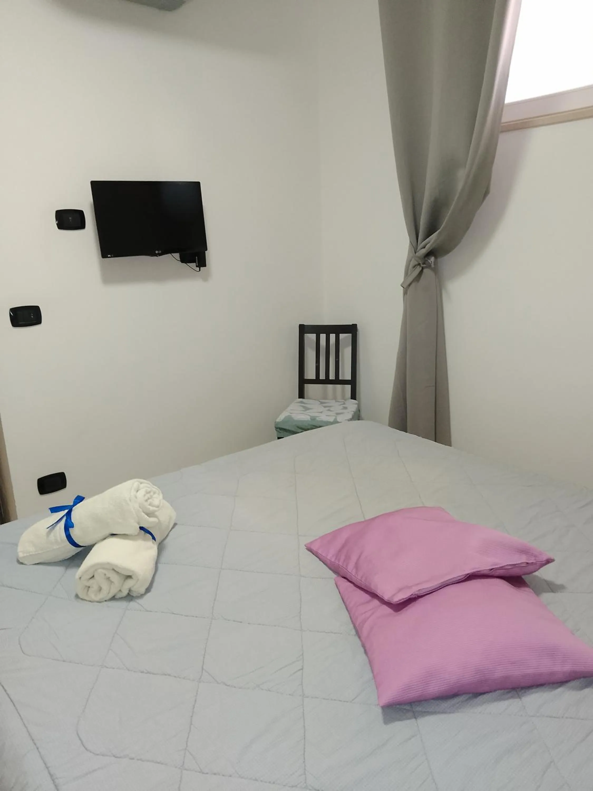 Bed in Art Village Residence