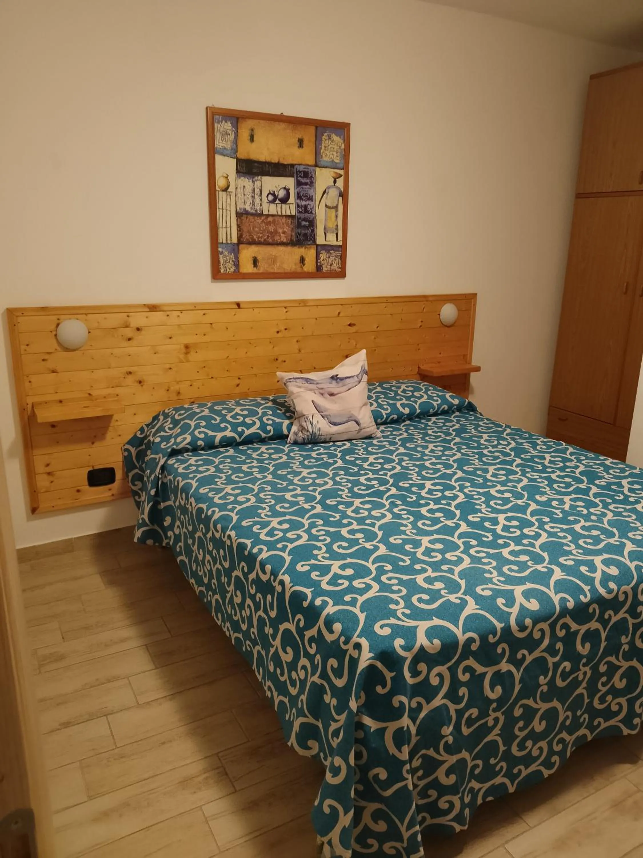 Bed in Art Village Residence