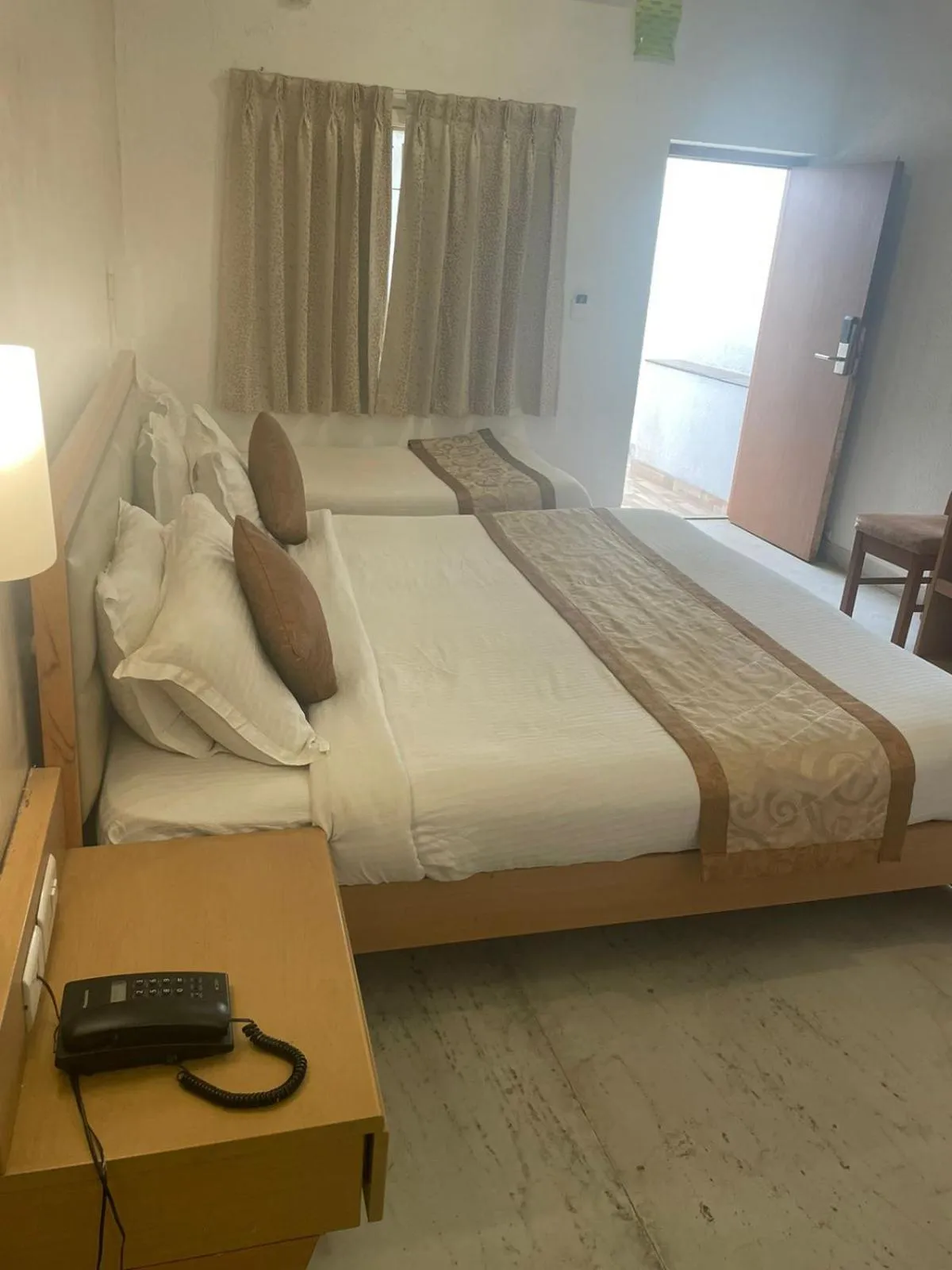 Photo of the whole room, Bed in Avenue 11 Boutique Residences, Poes Garden Chennai