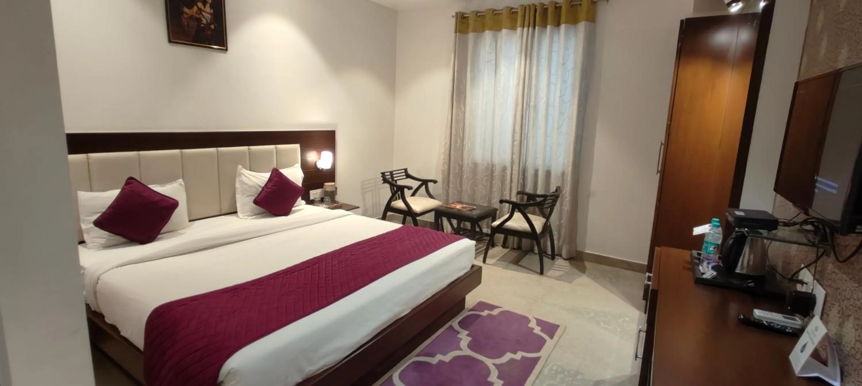 Bed in Hotel Taj Heights