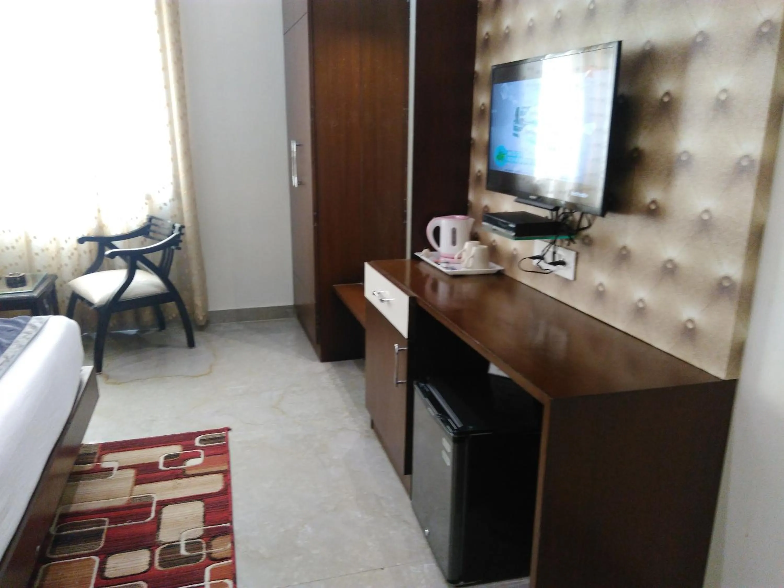 TV and multimedia, Bed in Hotel Taj Heights