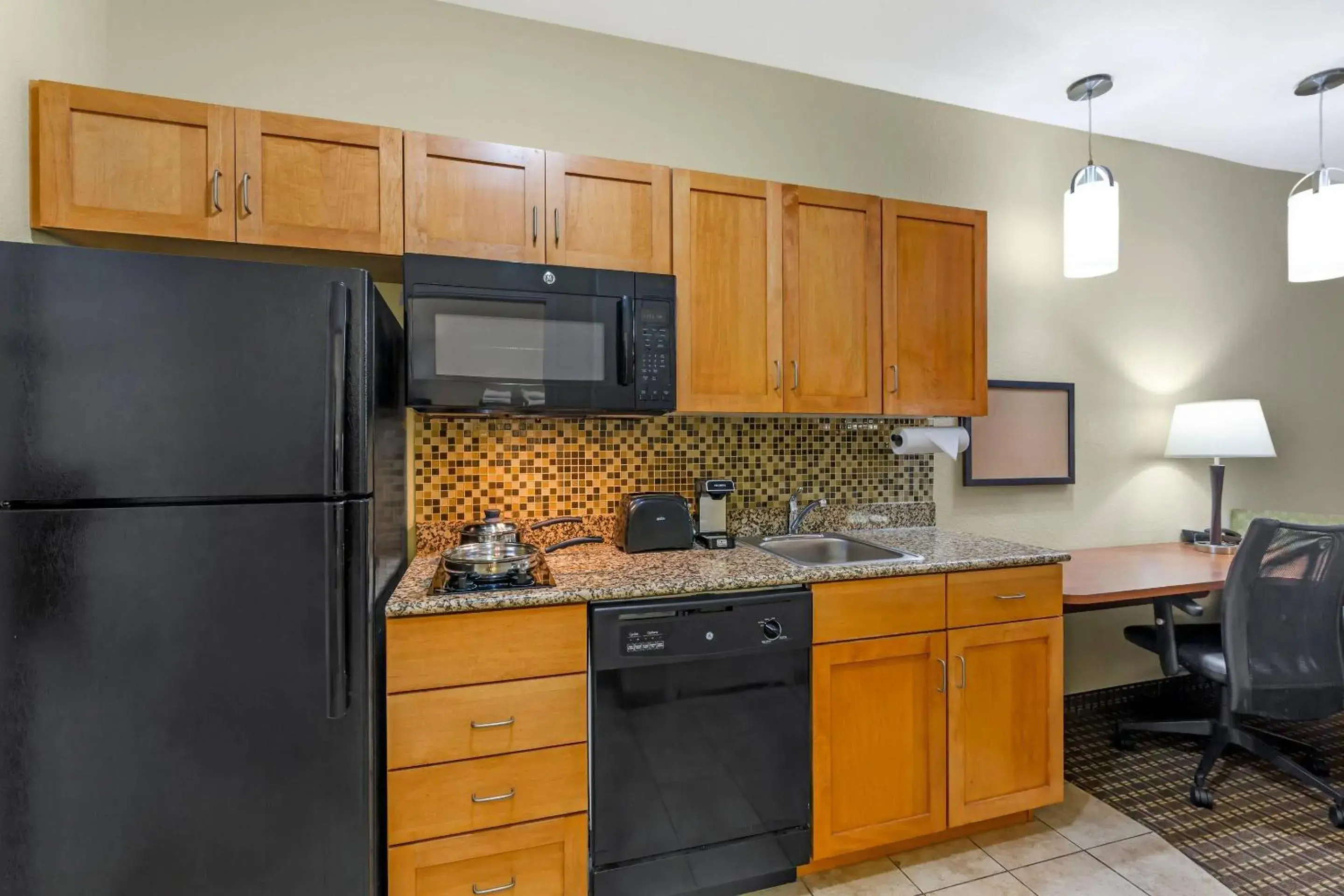 Bedroom in MainStay Suites Stanley Bedroom in MainStay Suites Stanley