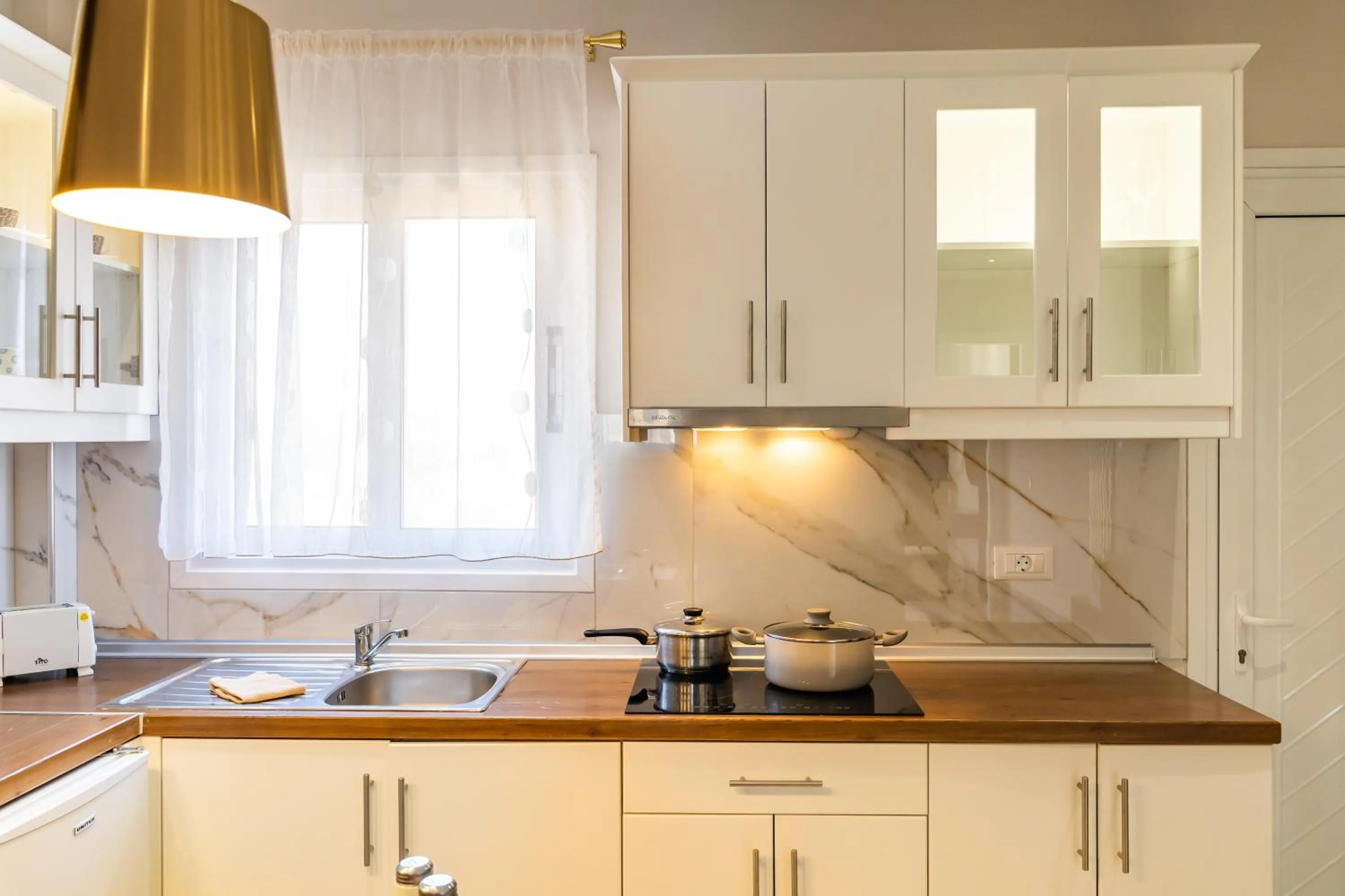 kitchen in Mikes Apts