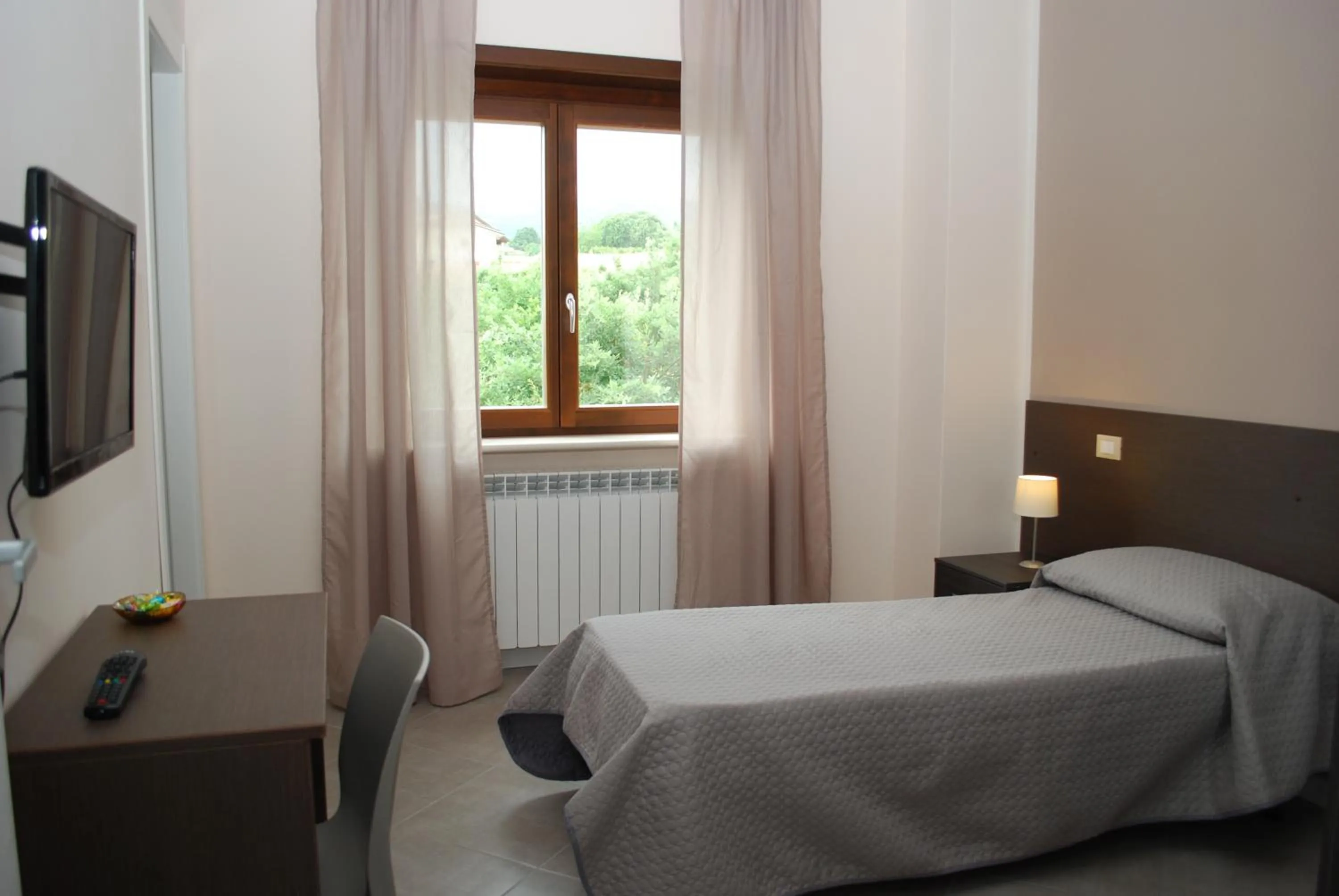 Bed in B&B Grandangolo