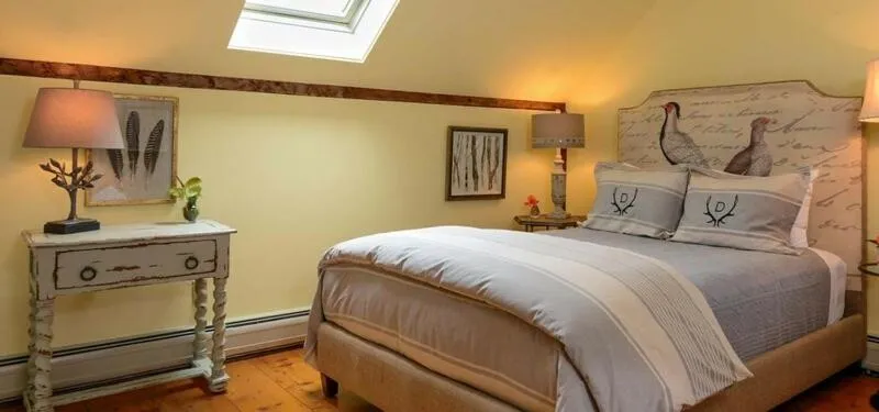 Bed in Deer Brook Inn