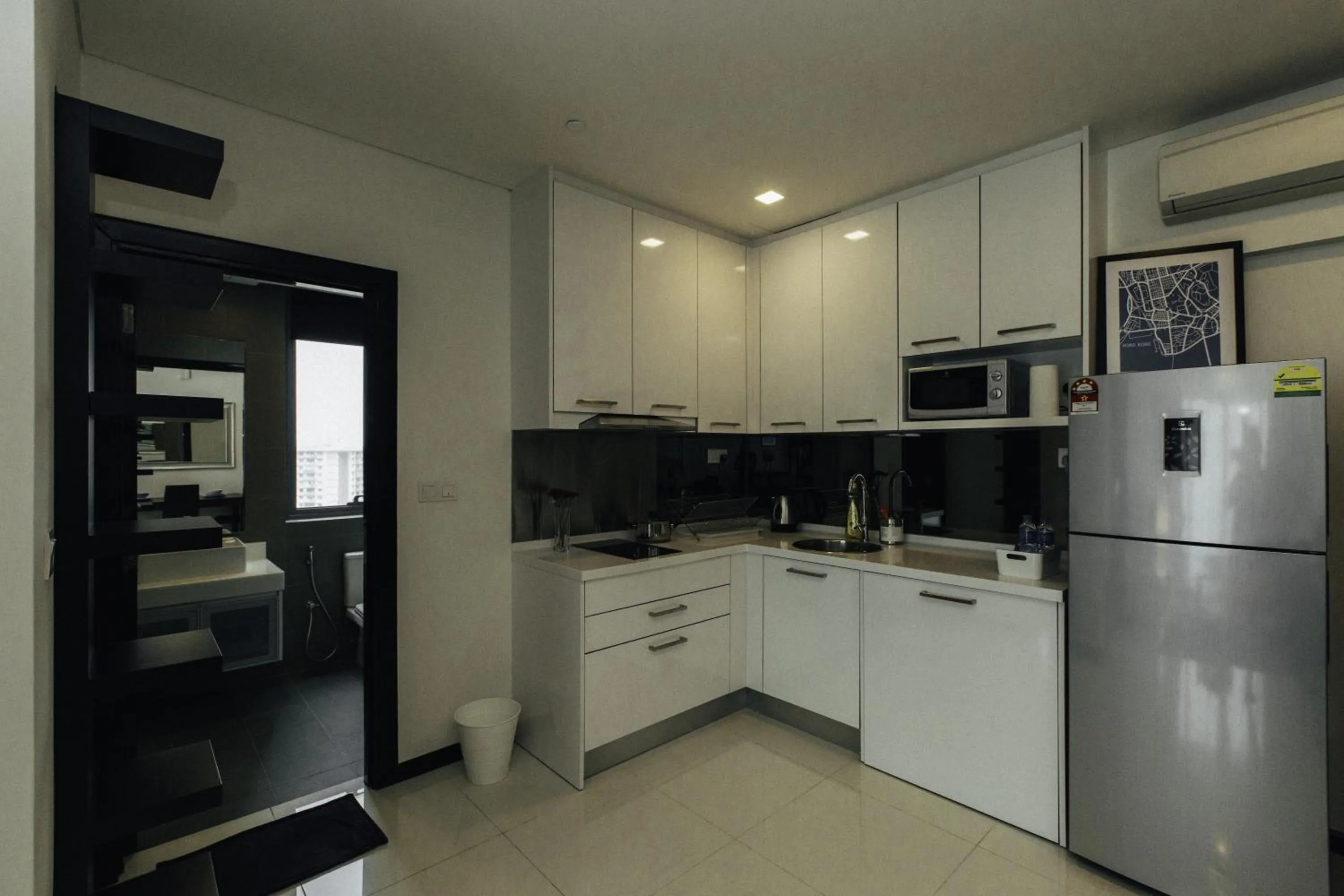 Kitchen or kitchenette in Mercu Summer Suites Bernice KLCC