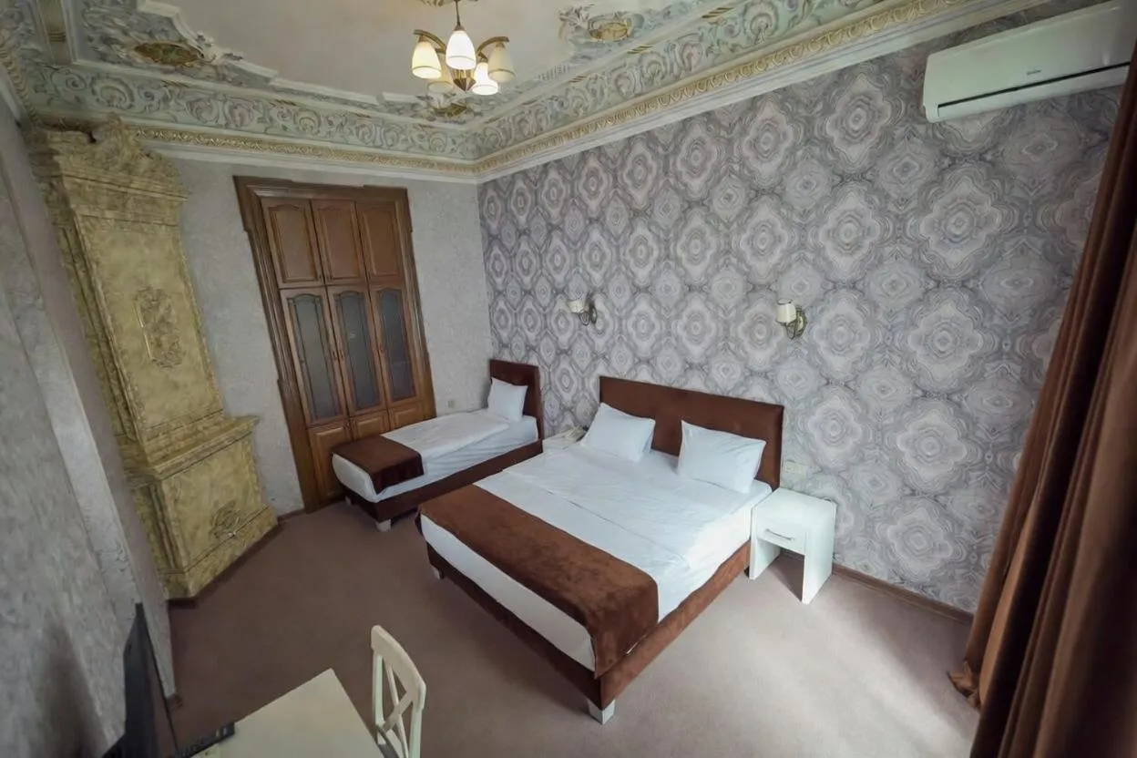 Bed in Nizami Boutique Hotel
