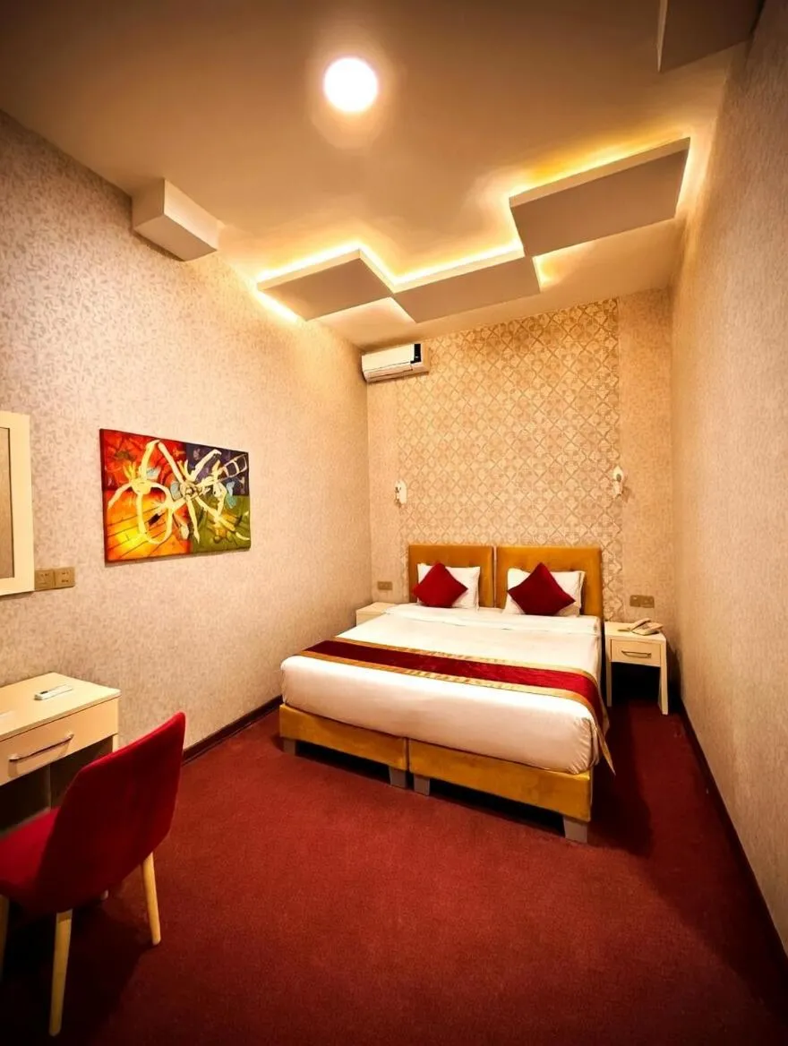 Bed in Nizami Boutique Hotel