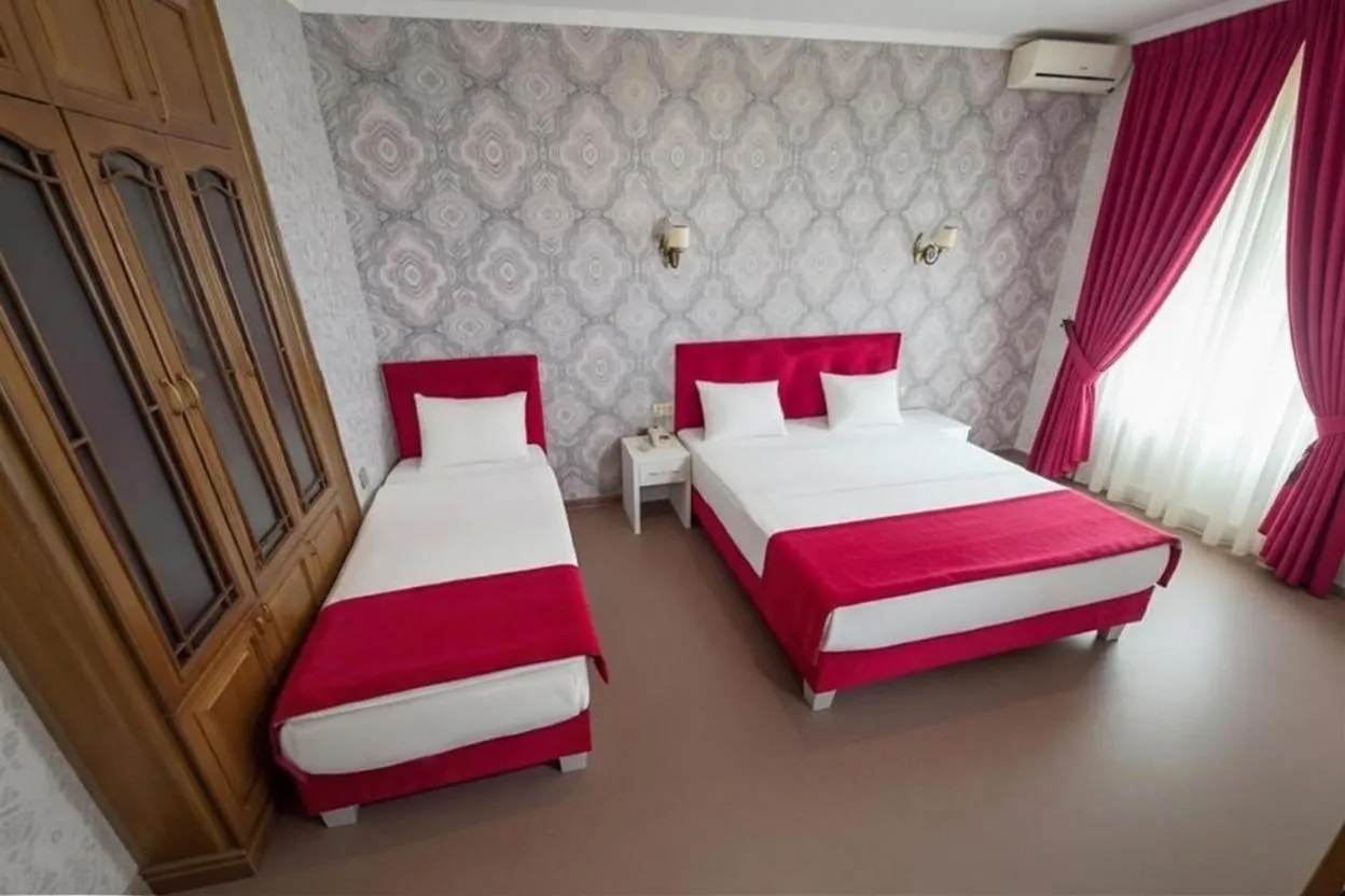 Bed in Nizami Boutique Hotel