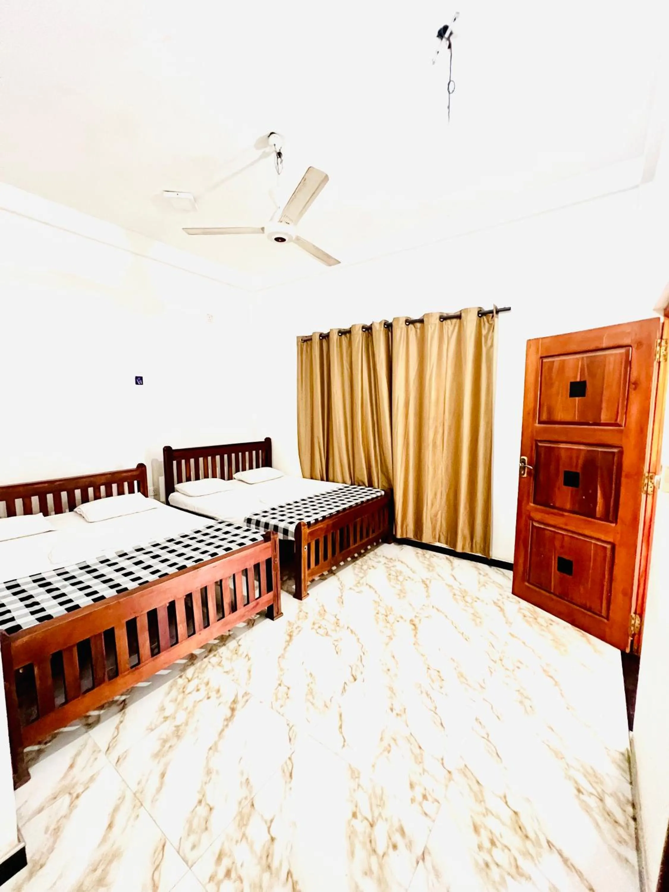 Bed in Monkey Garden Hotel