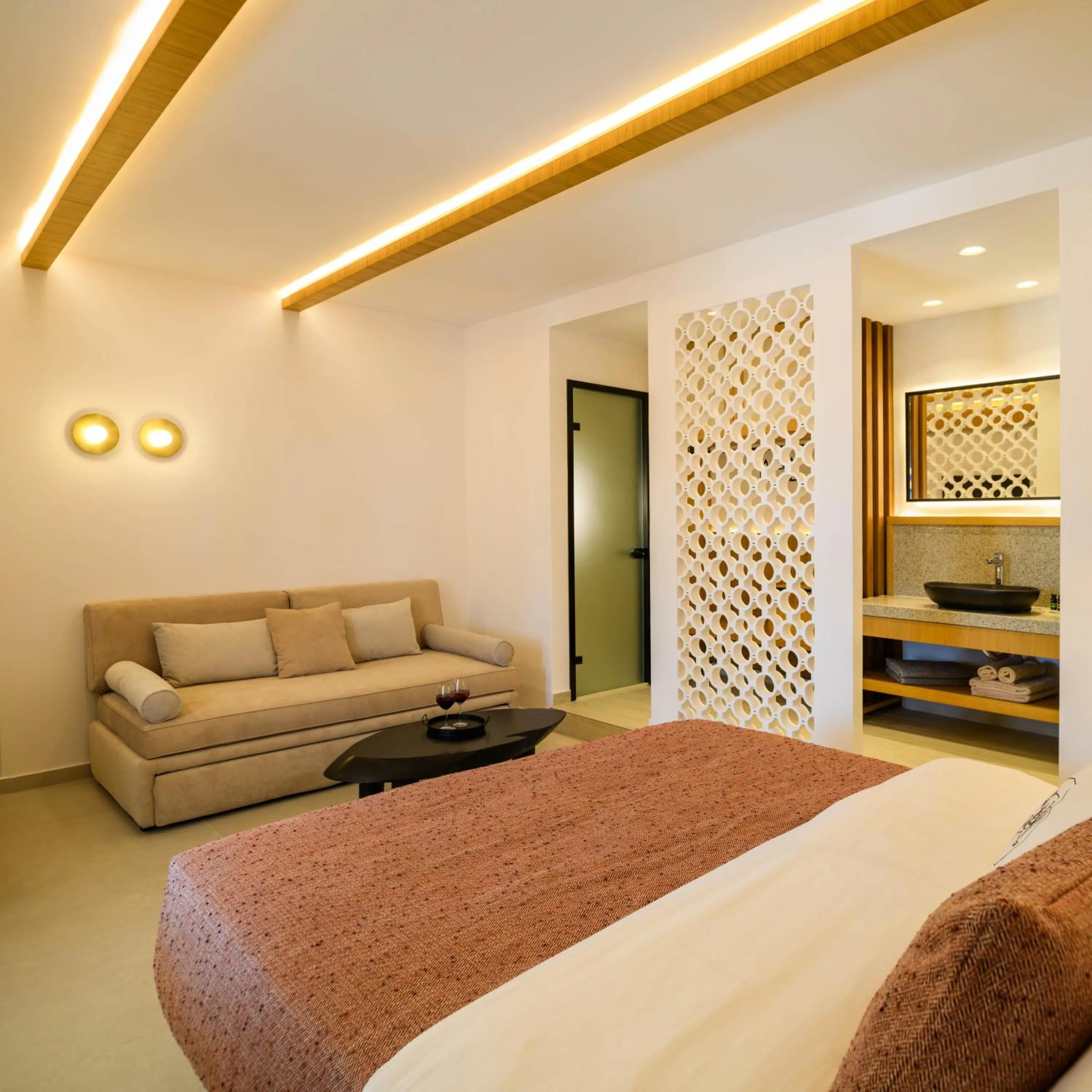 Bed in Safrani Suites